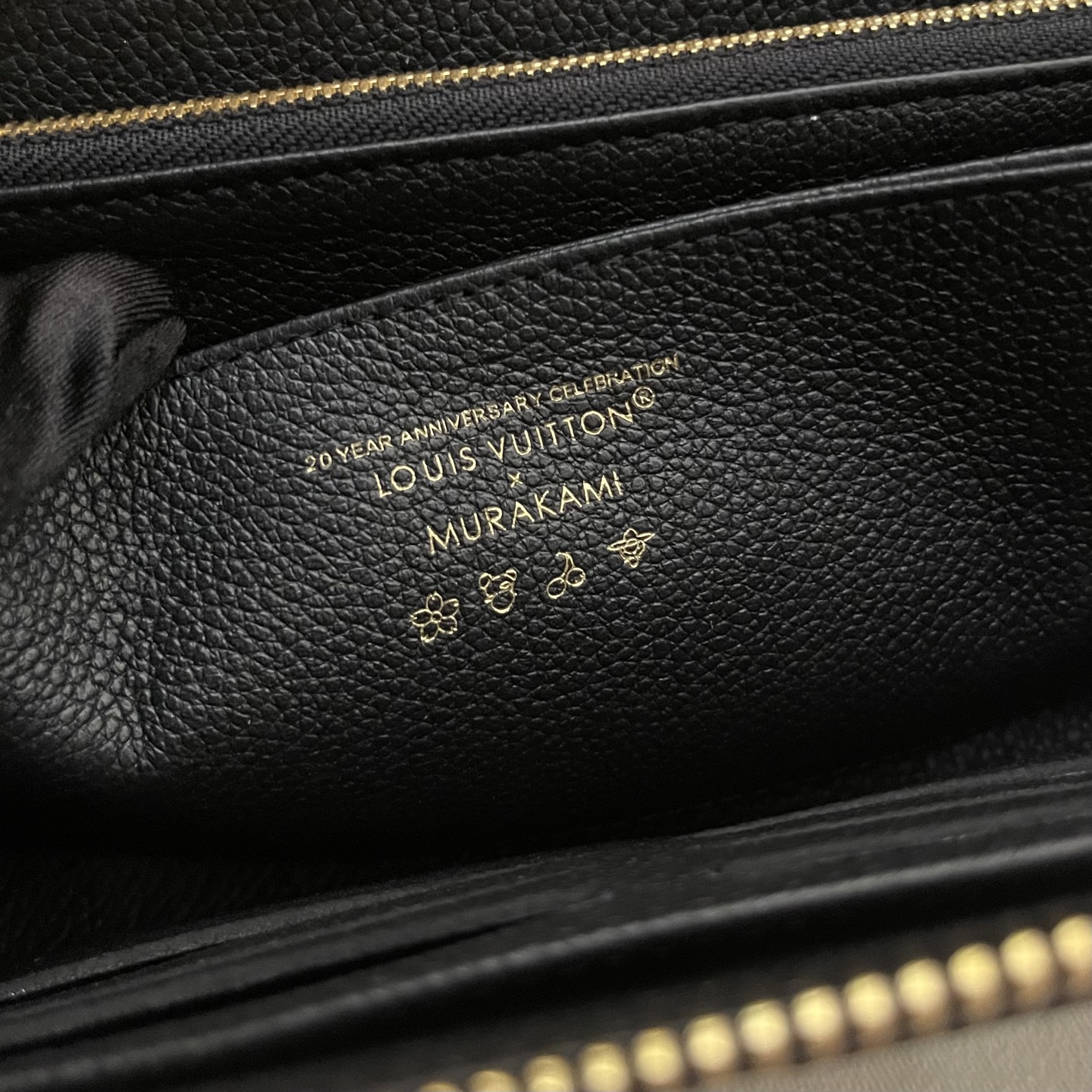 Louis Vuitton Black Monogram Embossed Zippy Wallet with Cartoon 9 i1743087393051 5739 0 7
