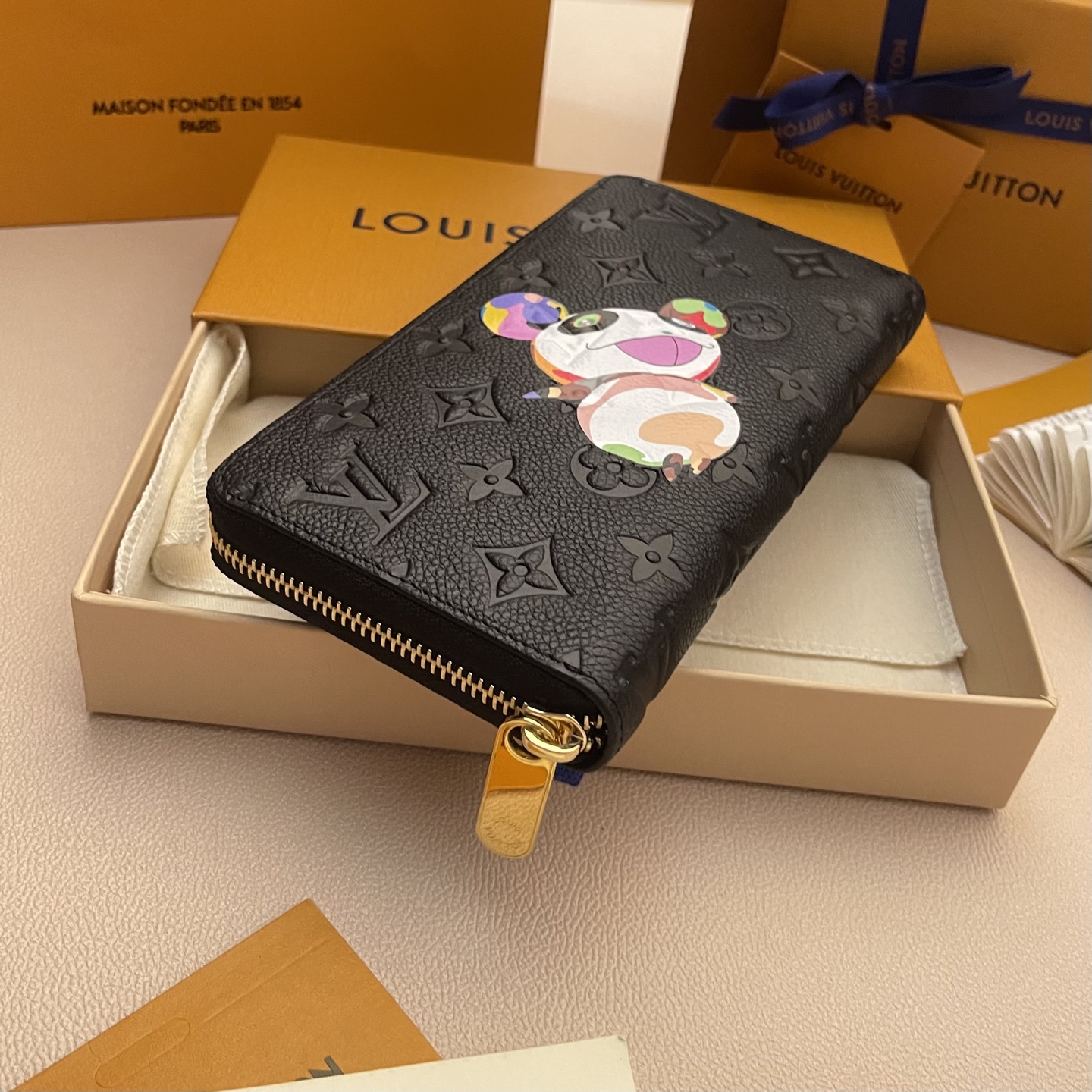 Louis Vuitton Black Monogram Embossed Zippy Wallet with Cartoon 4 i1743087393178 3964 0 2