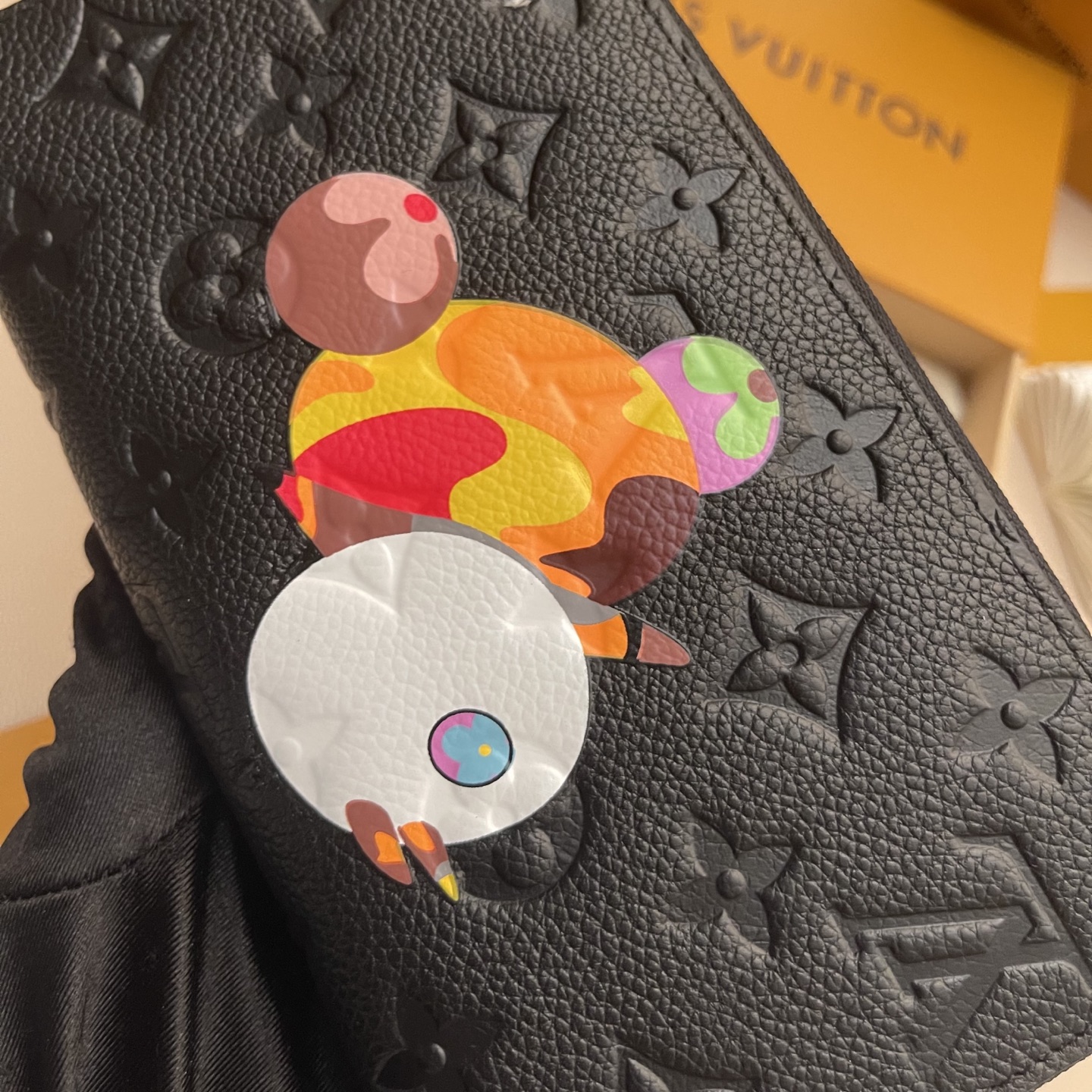 Louis Vuitton Black Monogram Embossed Zippy Wallet with Cartoon 6 i1743087397259 2104 0 4