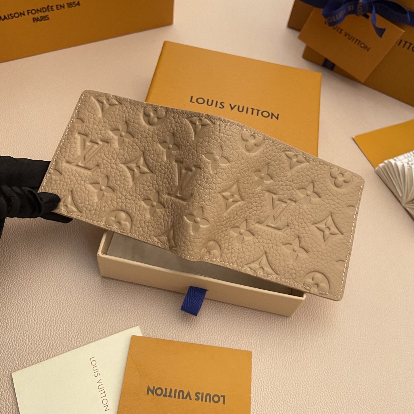Louis Vuitton Multiple Wallet Taurillon Leather Khaki Monogram Embossed 4 i1743595423409 2626 0 3