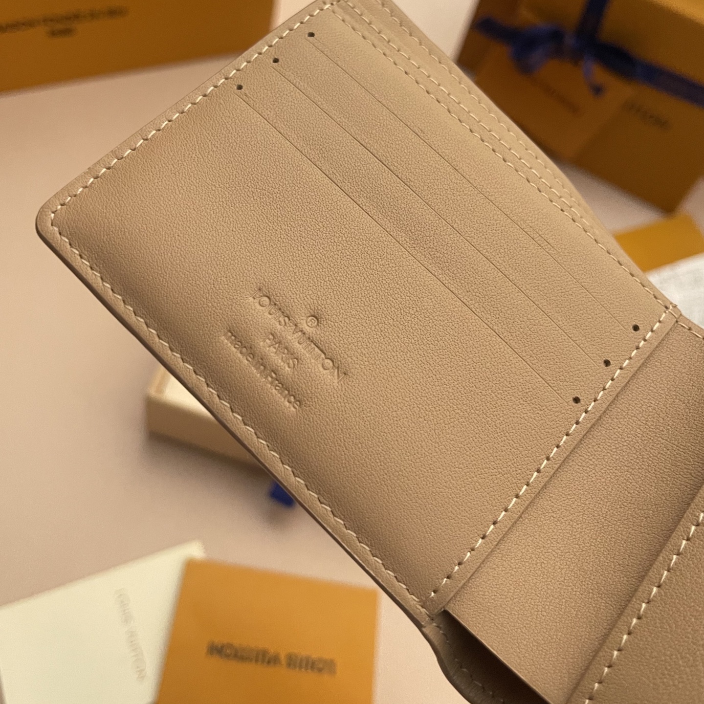Louis Vuitton Multiple Wallet Taurillon Leather Khaki Monogram Embossed 6 i1743595423491 7099 0 5