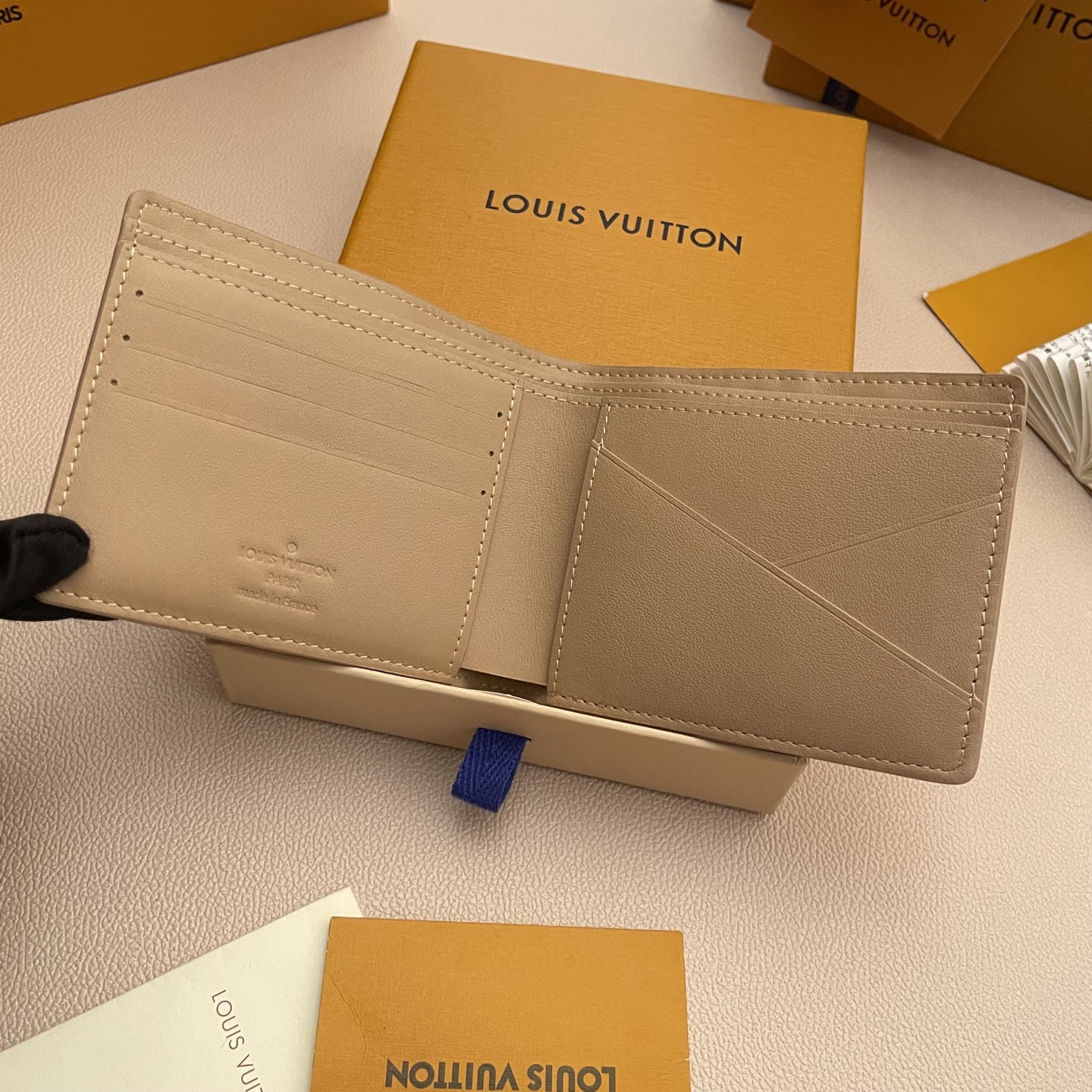 Louis Vuitton Multiple Wallet Taurillon Leather Khaki Monogram Embossed 5 i1743595424395 4529 0 4