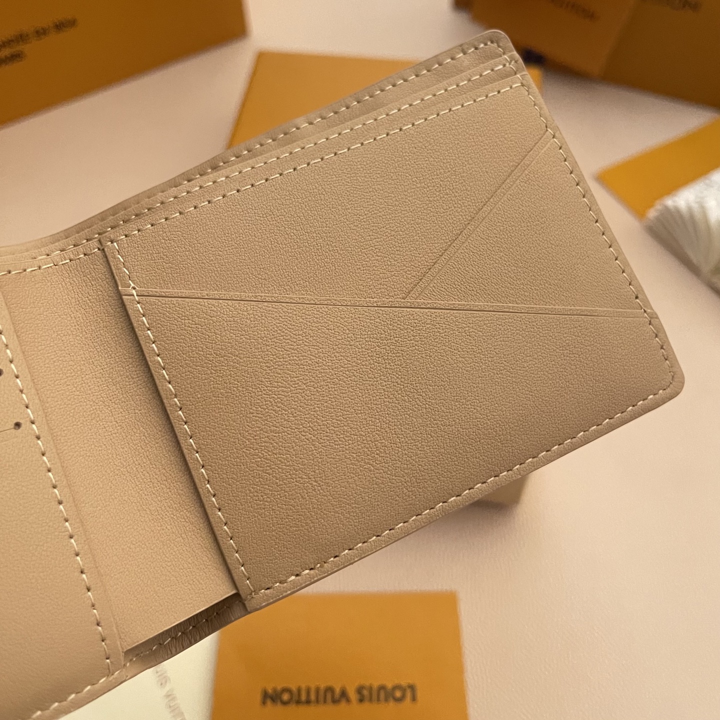 Louis Vuitton Multiple Wallet Taurillon Leather Khaki Monogram Embossed 7 i1743595424463 7297 0 6