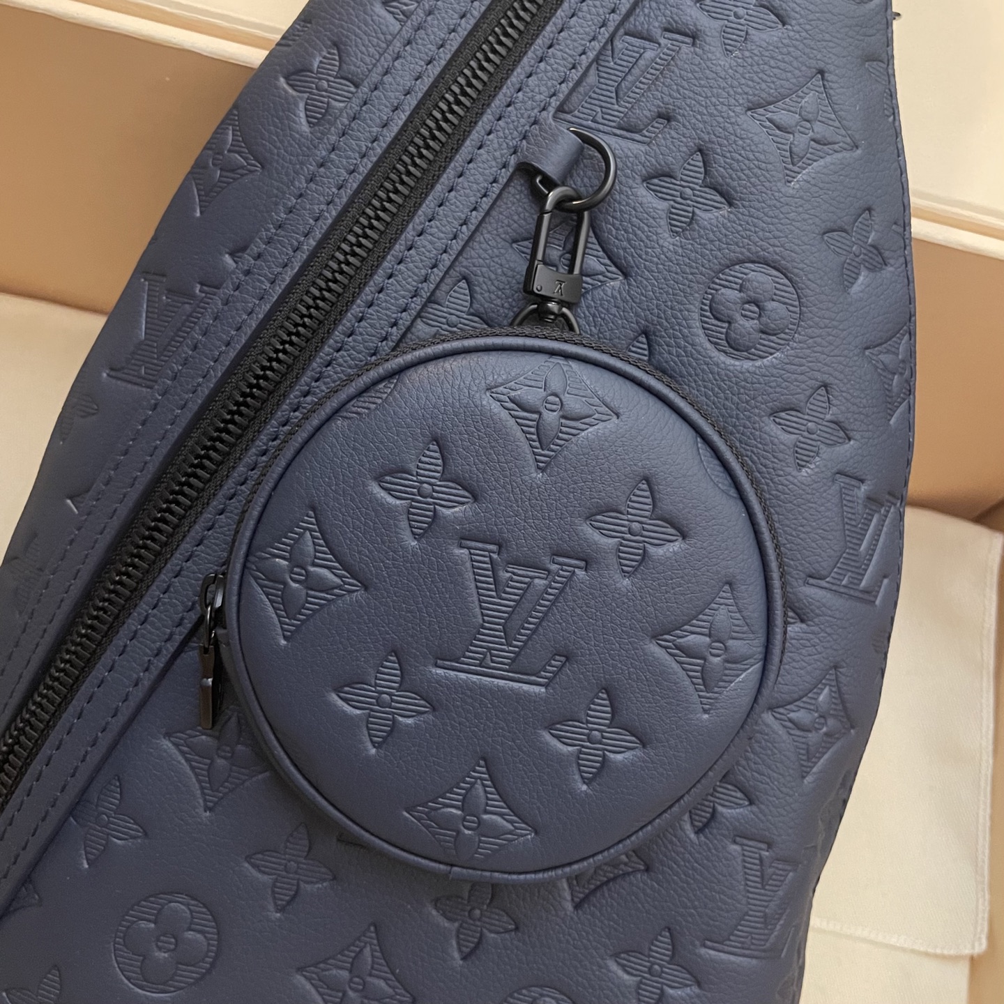 Louis Vuitton Duo Sling Bag:Embossed Leather,Adjustable Strap,Compact Design 3 i1745763196076 1378 0 2