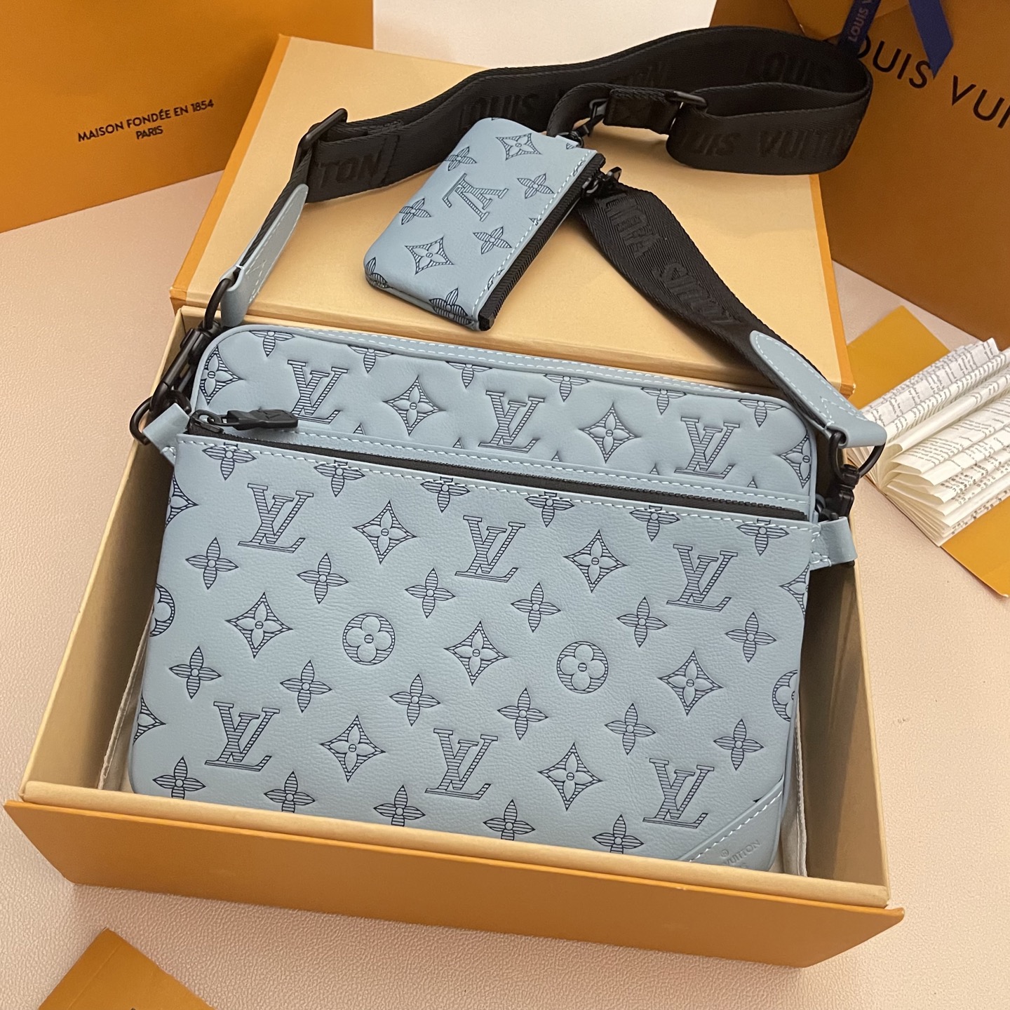 Louis Vuitton Trio Messenger Bag Monogram Shadow Leather Light Blue 2 i1747660074635 279 0 0