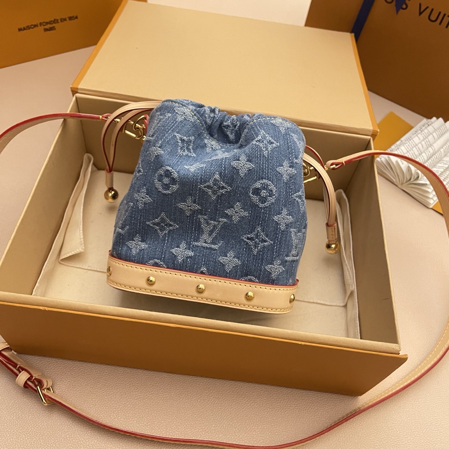 Louis Vuitton Nano Noé Denim Backpack, Monogram Accents & Gold Chain Detail 2 i1748354699080 8510 0 1