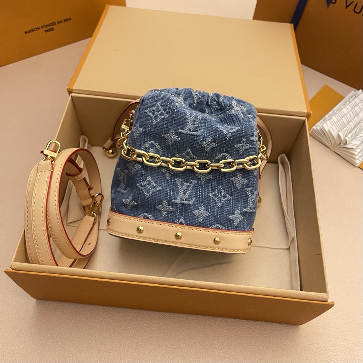 Louis Vuitton Nano Noé Denim Backpack, Monogram Accents & Gold Chain Detail 1 i1748354700560 9799 0 0