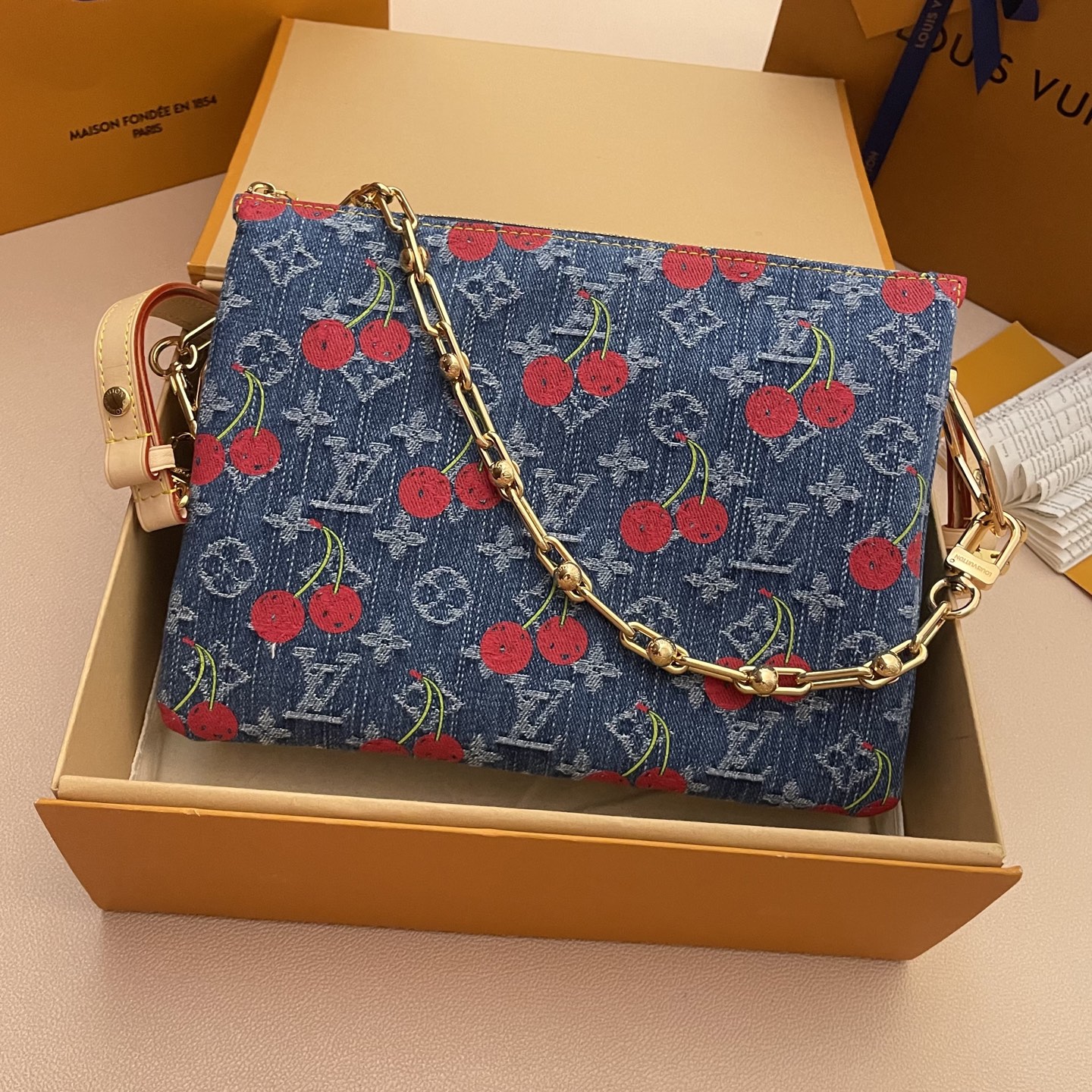 Louis Vuitton Coussin Small Handbag Monogram Denim Cherry, 26 x 20 x 12 cm 2 i1748440205237 7088 0 0