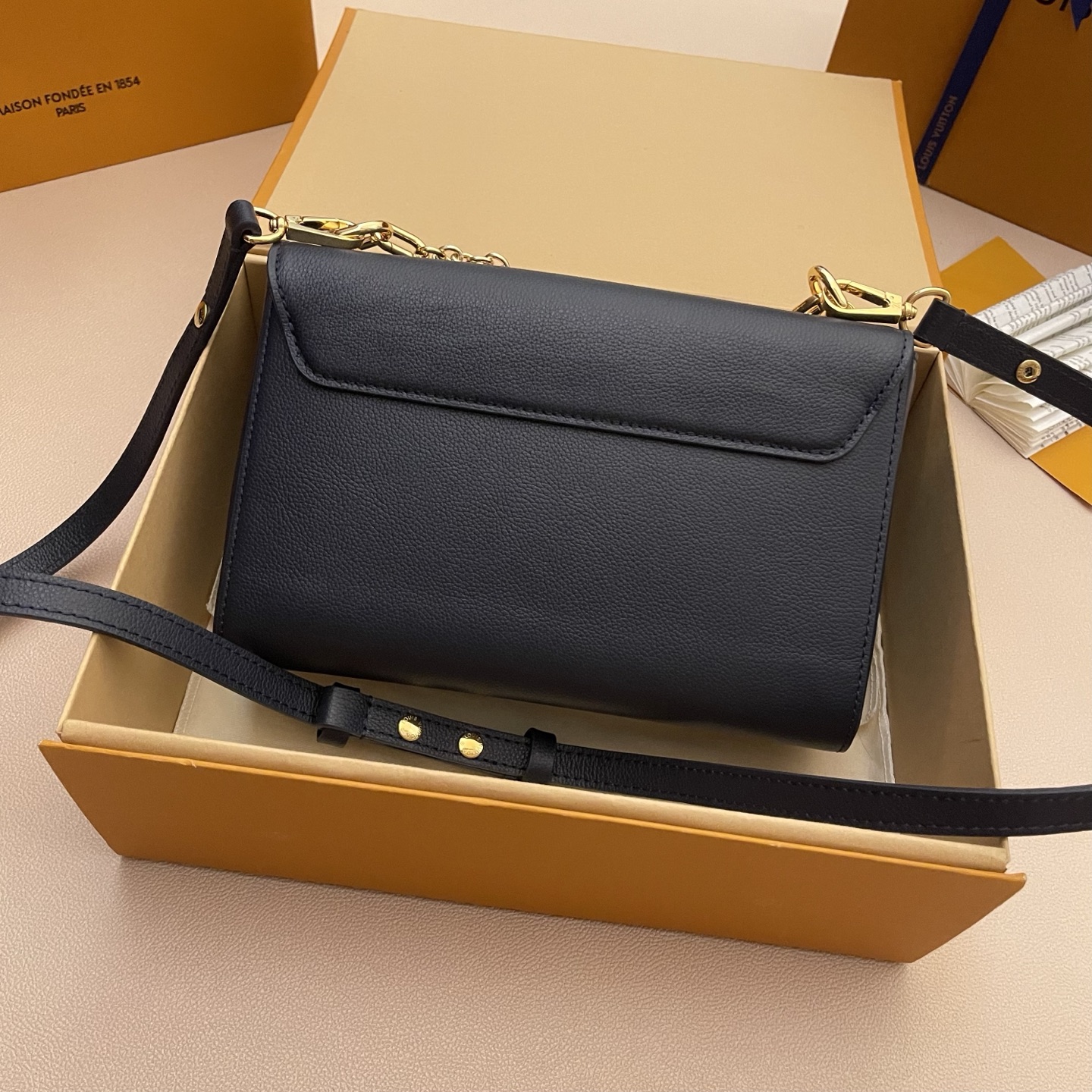 Louis Vuitton Twist Slim Black Leather Bag with Chain and Twist Lock 2 i1748530052592 1183 0 1