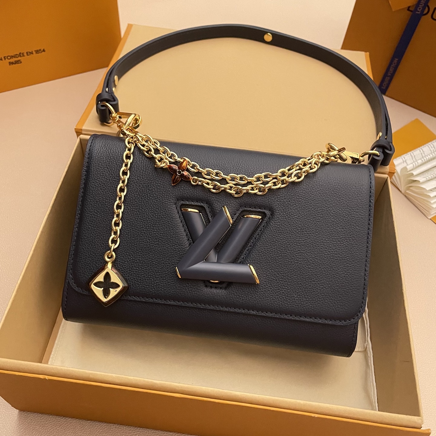 Louis Vuitton Twist Slim Black Leather Bag with Chain and Twist Lock 1 i1748530052592 6774 0 0