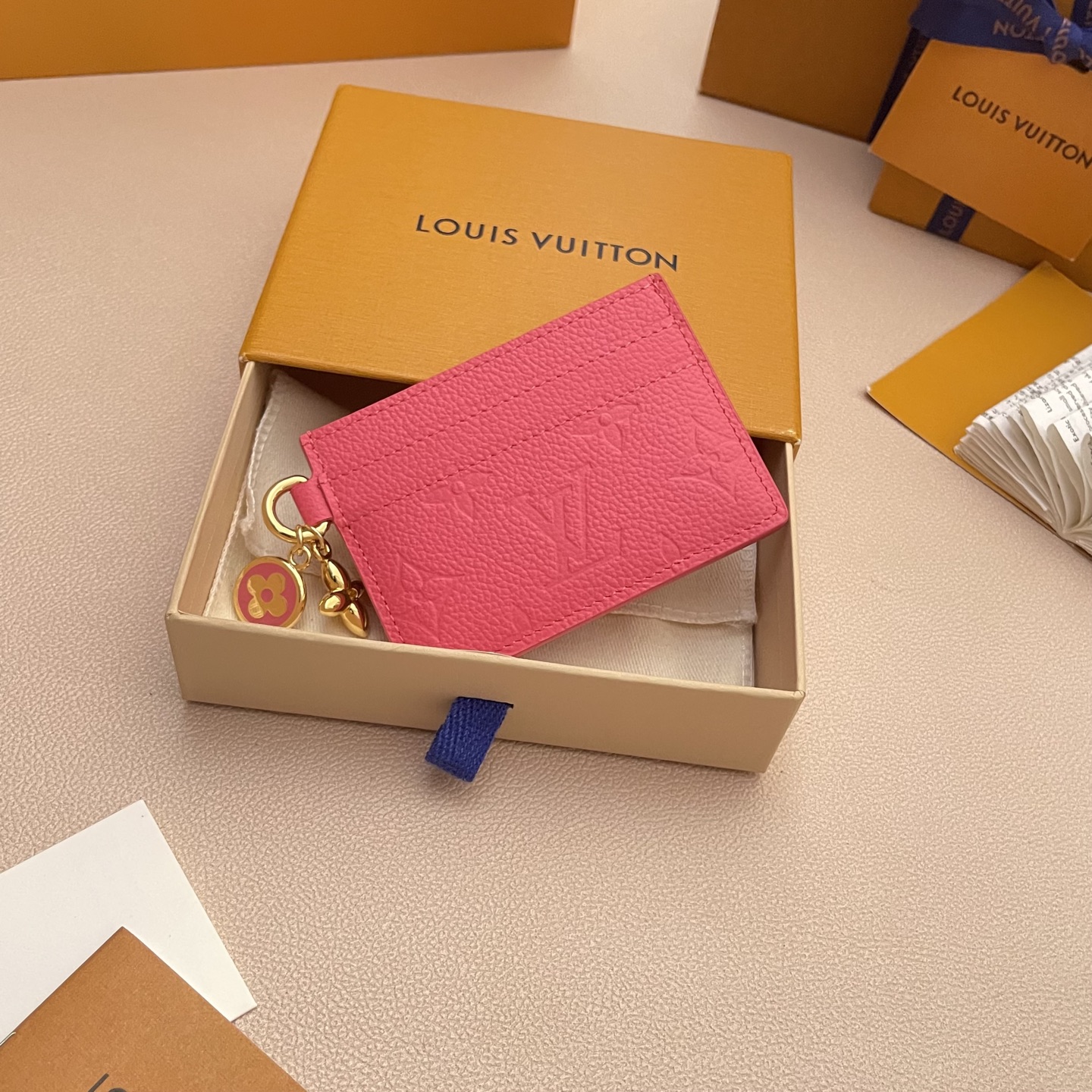Louis Vuitton Charms Card Holder in Pink Monogram Empreinte Leather 2 i1752332139571 2279 0 0