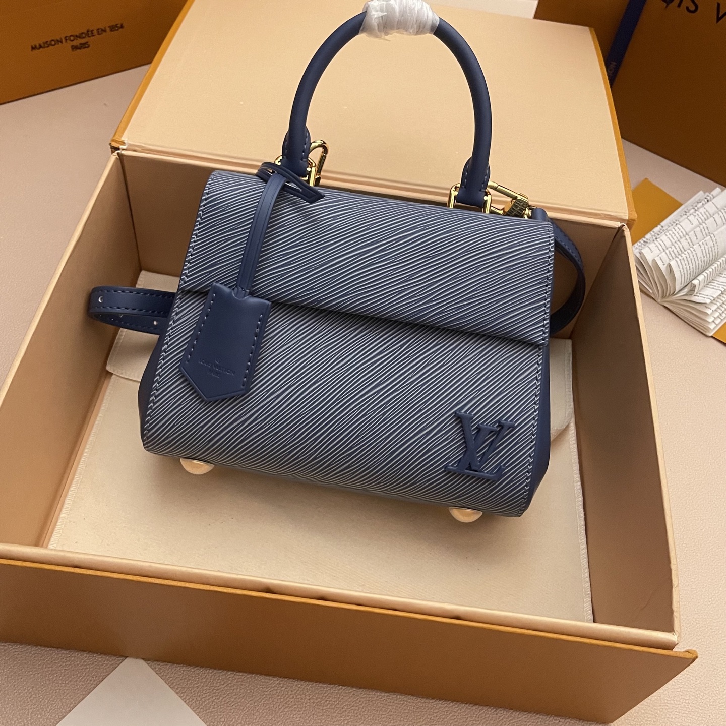 Louis Vuitton Cluny Mini Handbag in Epi Leather, Denim Inspired 1 i1752414726219 6445 0 0