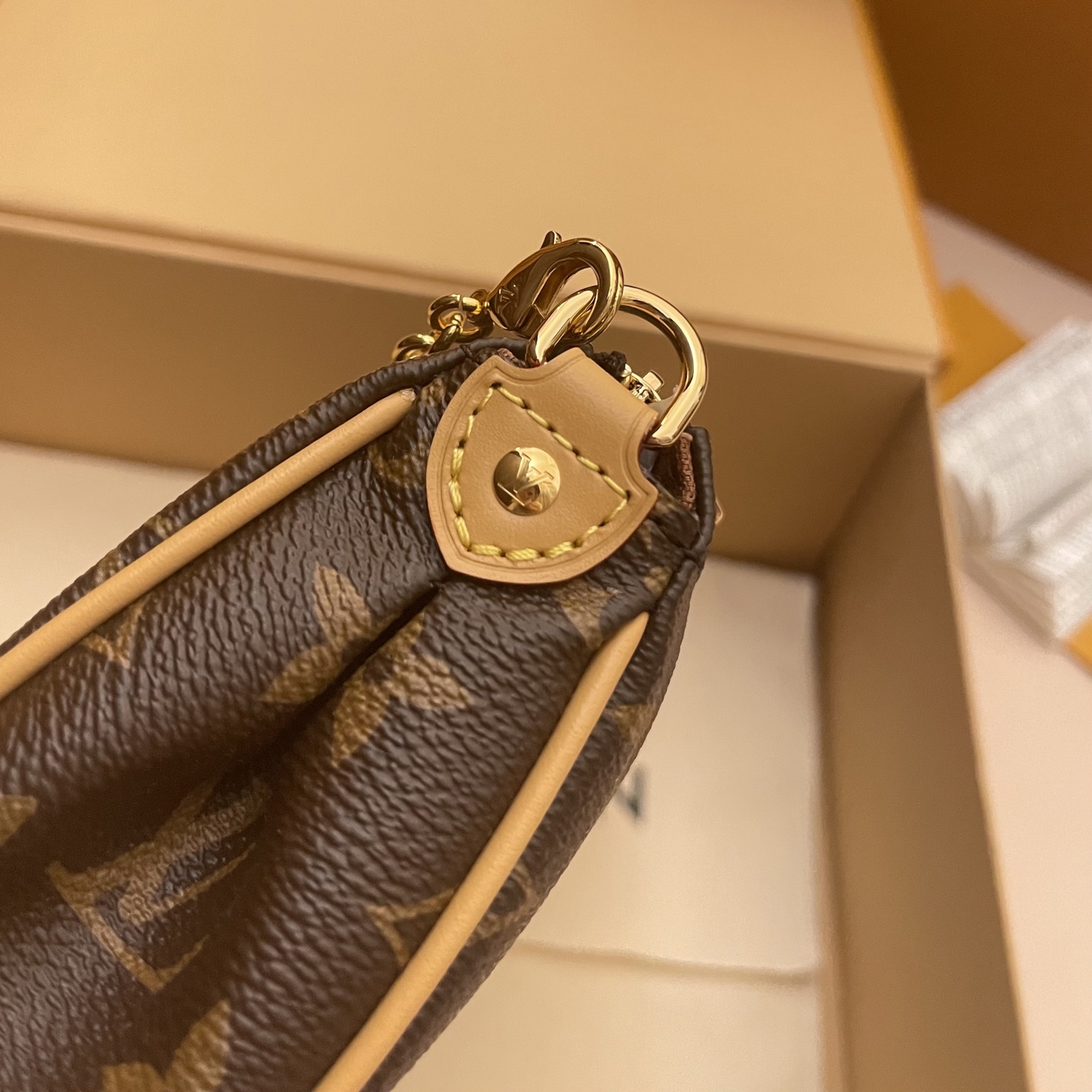 Louis Vuitton Monogram Pochette Eva Bag with Gold Chain - Stylish & Compact 5 i1752589505348 5369 0 4
