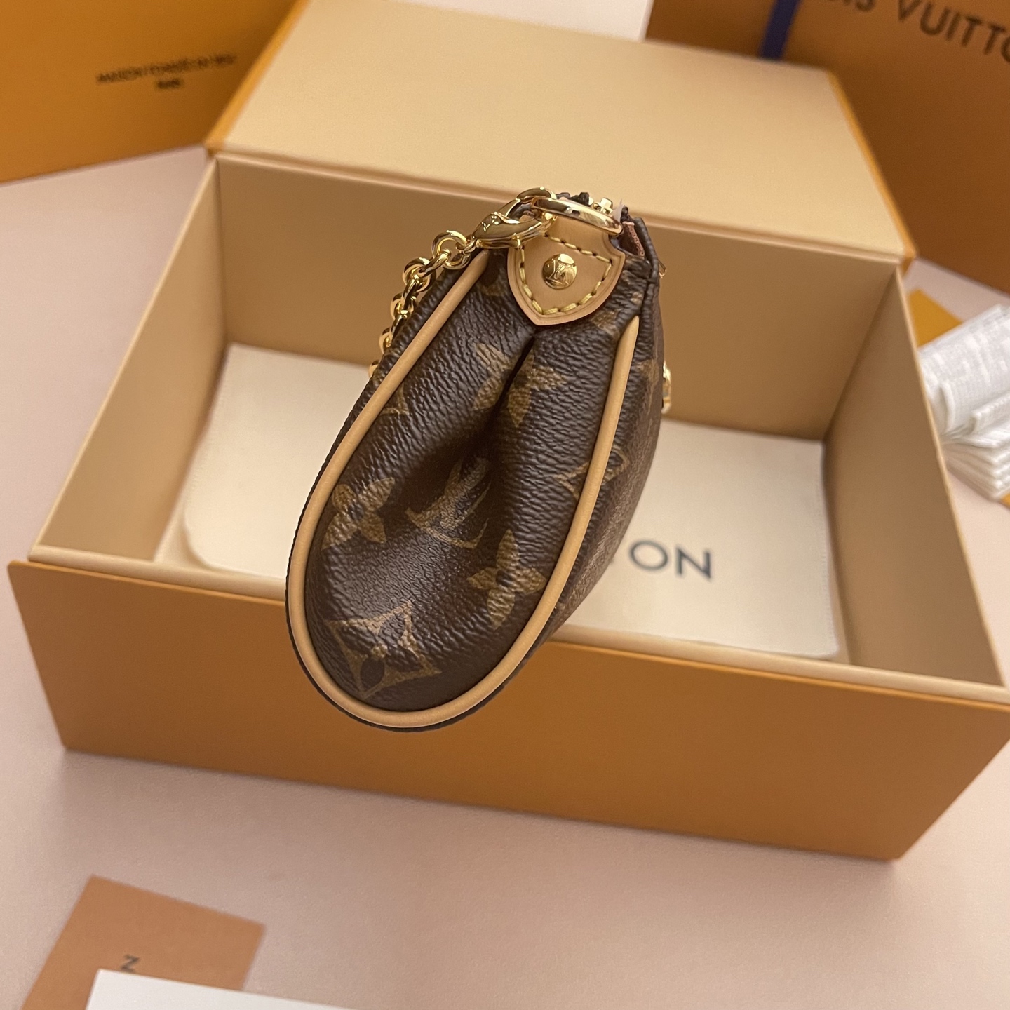 Louis Vuitton Monogram Pochette Eva Bag with Gold Chain - Stylish & Compact 3 i1752589506783 8095 0 2