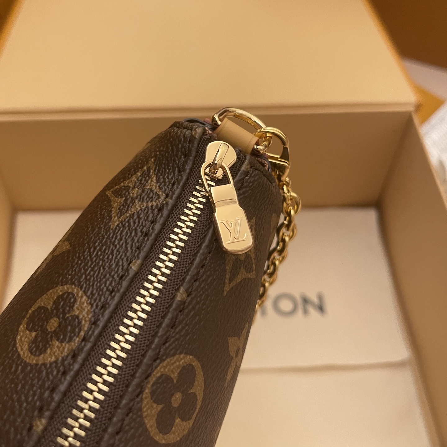 Louis Vuitton Monogram Pochette Eva Bag with Gold Chain - Stylish & Compact 7 i1752589509402 2668 0 8