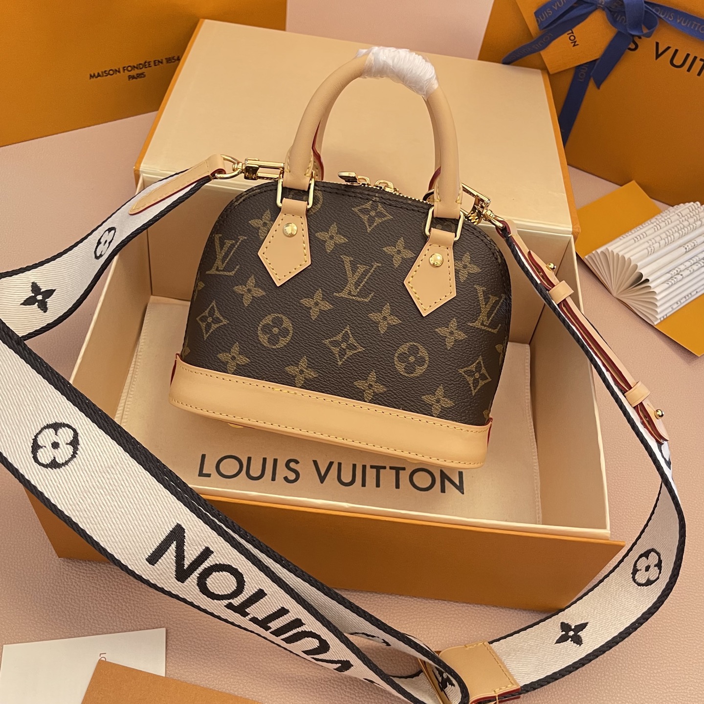 Louis Vuitton Alma Mini Monogram Canvas with Charms and Heart Coin Purse 2 i1754819113289 8669 0 1