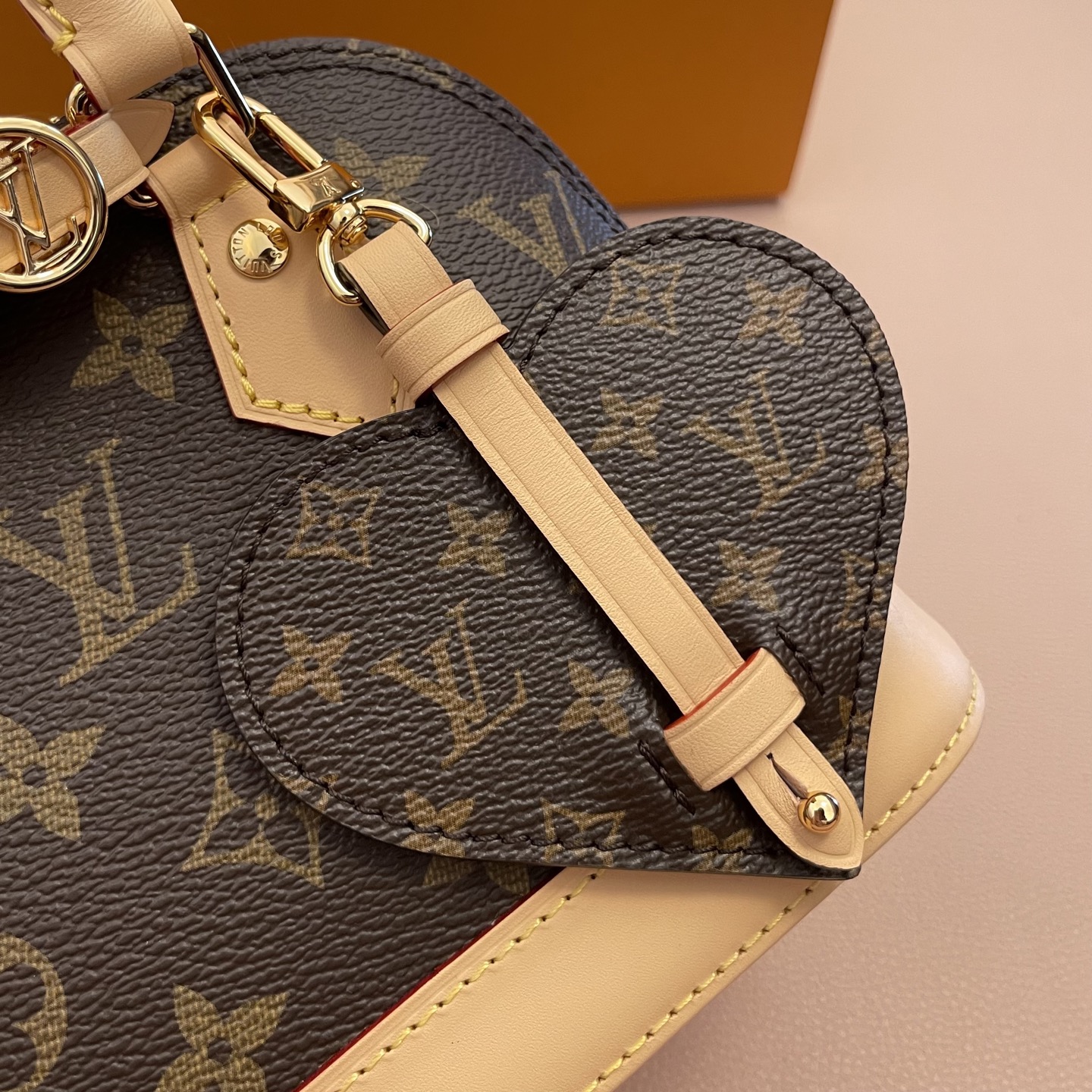 Louis Vuitton Alma Mini Monogram Canvas with Charms and Heart Coin Purse 5 i1754819113316 9849 0 4