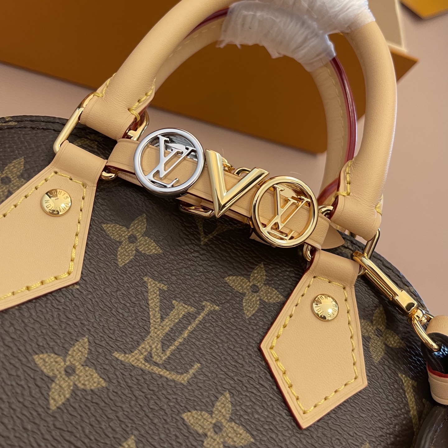 Louis Vuitton Alma Mini Monogram Canvas with Charms and Heart Coin Purse 3 i1754819124194 5156 0 2