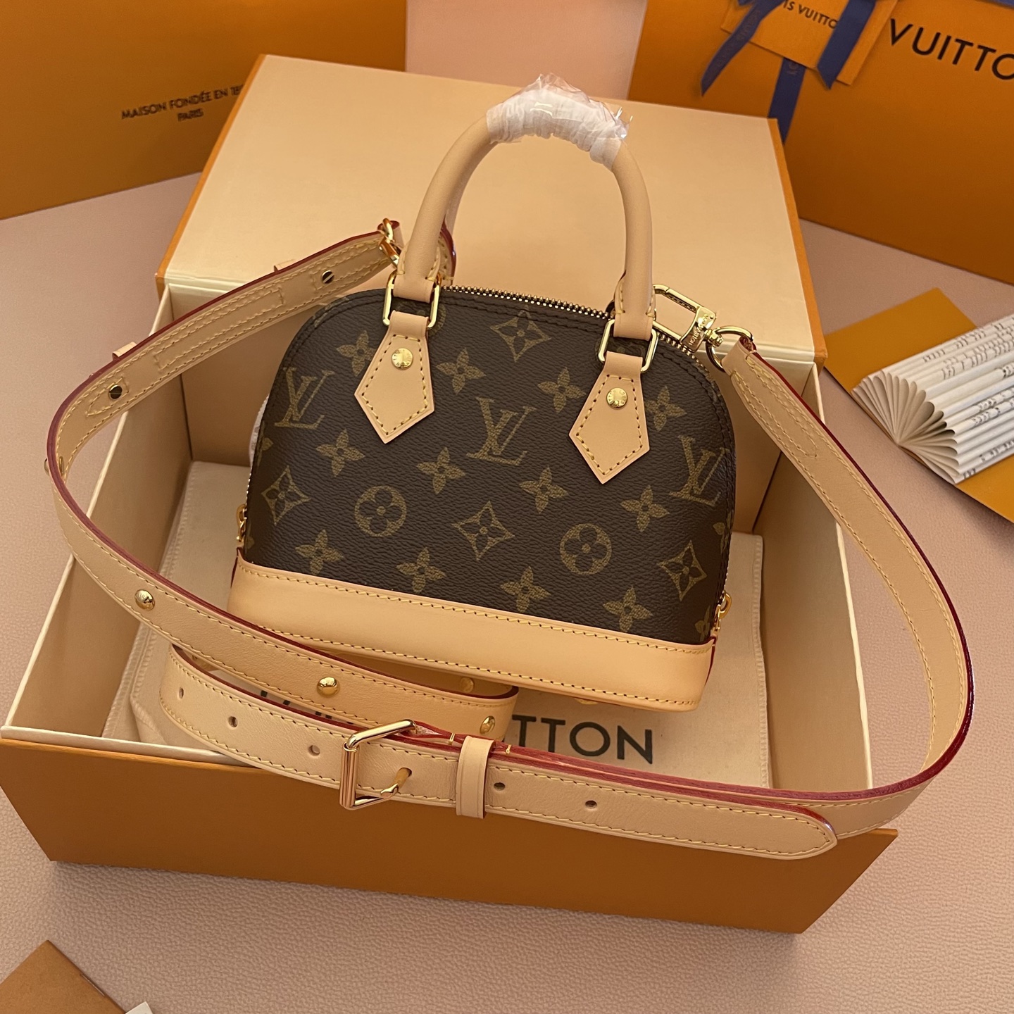 Louis Vuitton Alma Mini Monogram Canvas with Charms and Coin Purse 2 i1754911680145 2499 0 1