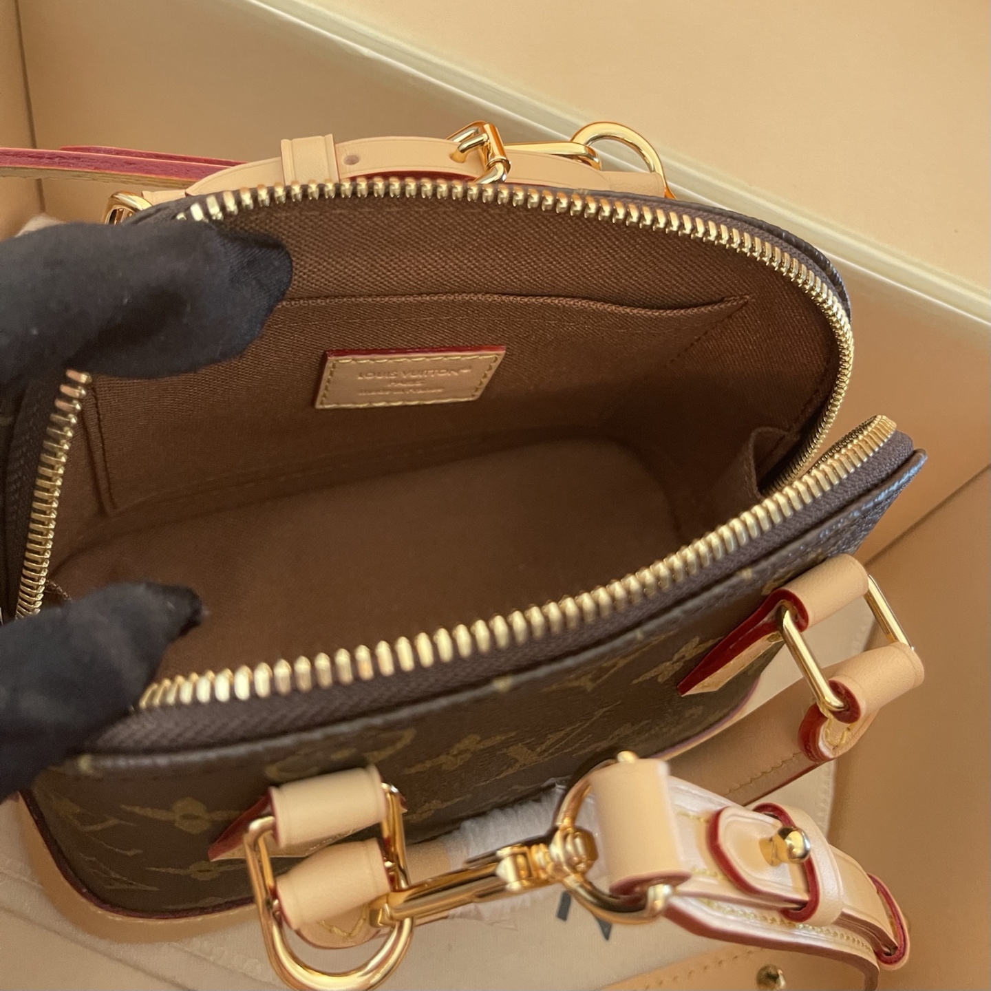 Louis Vuitton Alma Mini Monogram Canvas with Charms and Coin Purse 8 i1754911680163 9759 0 7