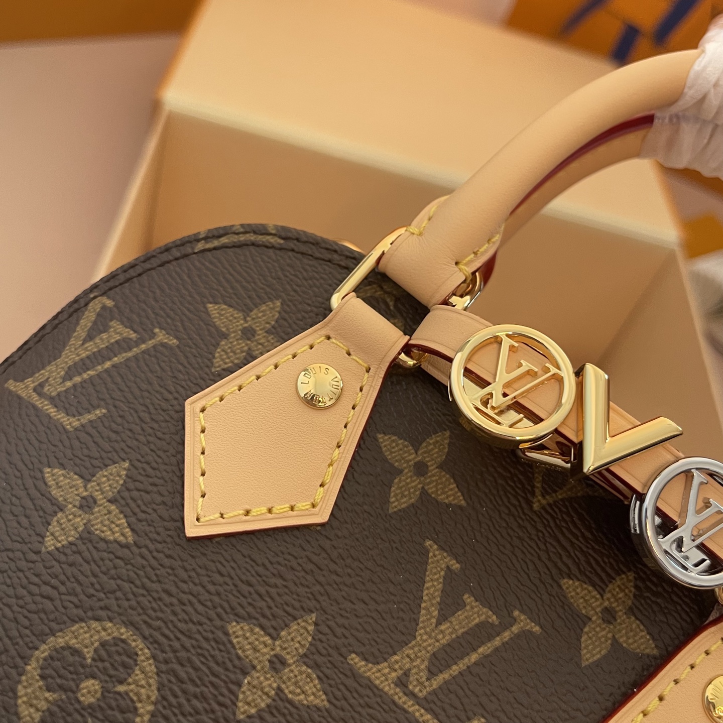 Louis Vuitton Alma Mini Monogram Canvas with Charms and Coin Purse 3 i1754911682068 9822 0 2