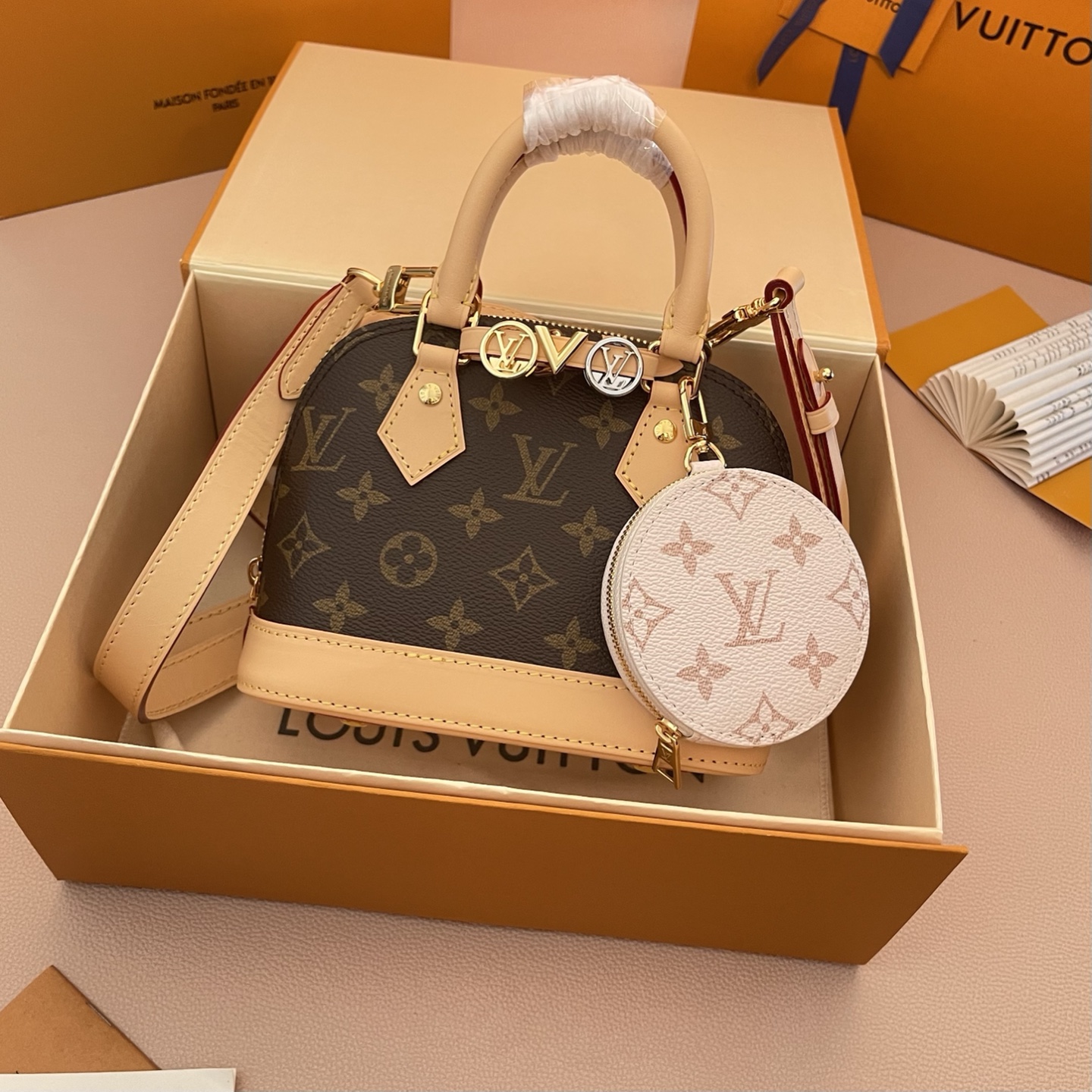 Louis Vuitton Alma Mini Monogram Canvas with Charms and Coin Purse 1 i1754911682082 360 0 0