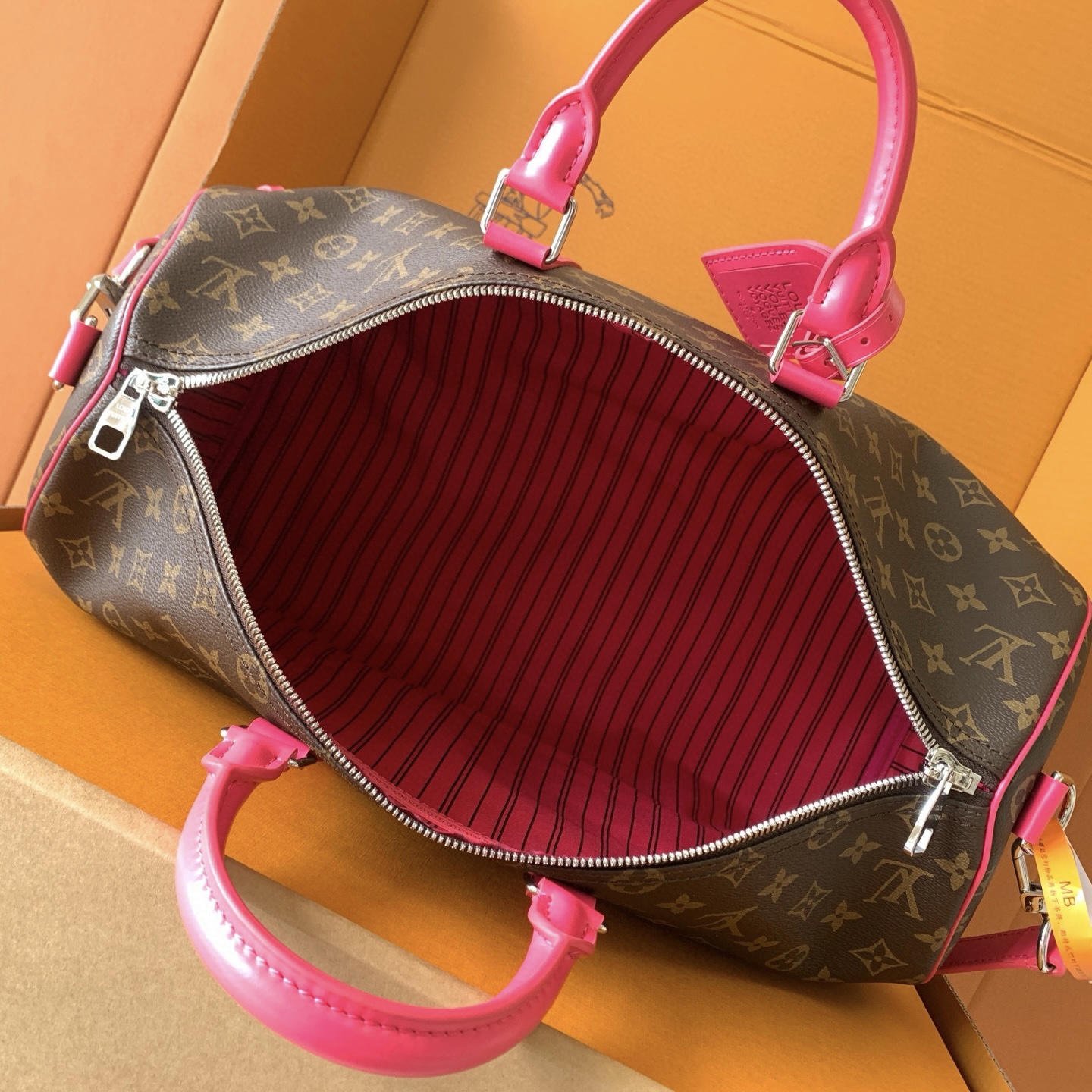 Louis Vuitton Keepall Bandoulière 45 Monogram Canvas with Pink Leather 9 i1754912667664 6897 0 6