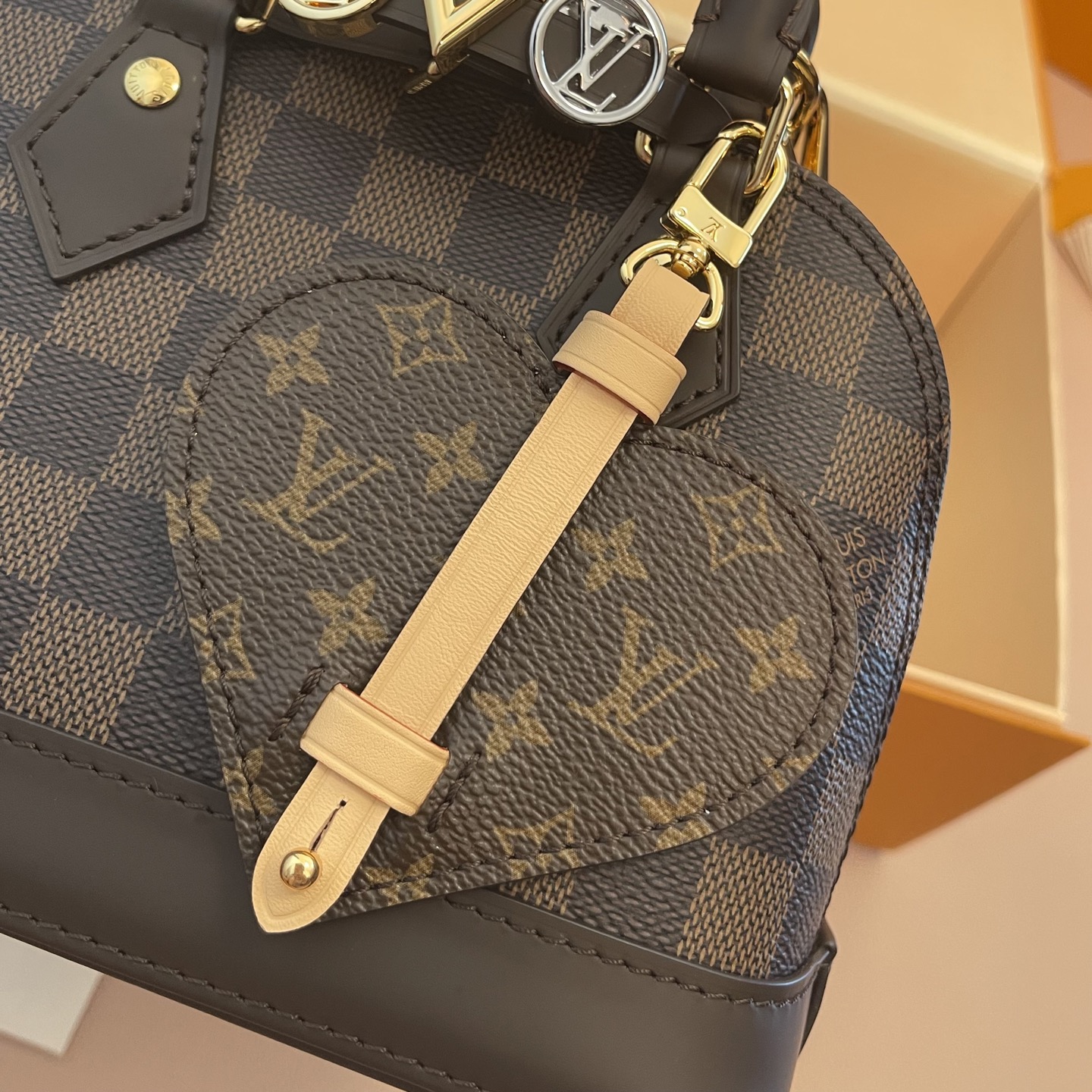 Louis Vuitton Alma Mini Handbag Damier Ebene Canvas with Heart Bag Charm 6 i1754914137423 7090 0 4