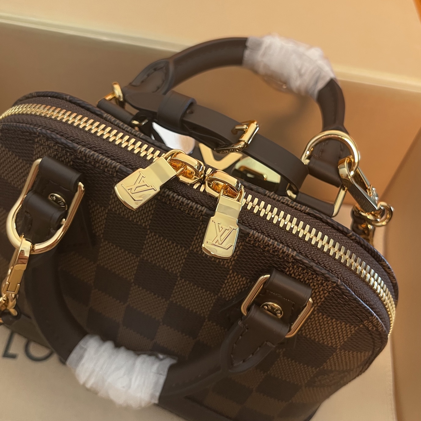 Louis Vuitton Alma Mini Handbag Damier Ebene Canvas with Heart Bag Charm 8 i1754914137458 6480 0 6
