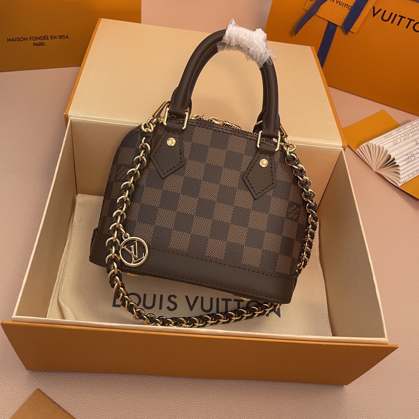Louis Vuitton Alma Mini Handbag Damier Ebene Canvas with Heart Bag Charm 3 i1754914137468 9859 0 1