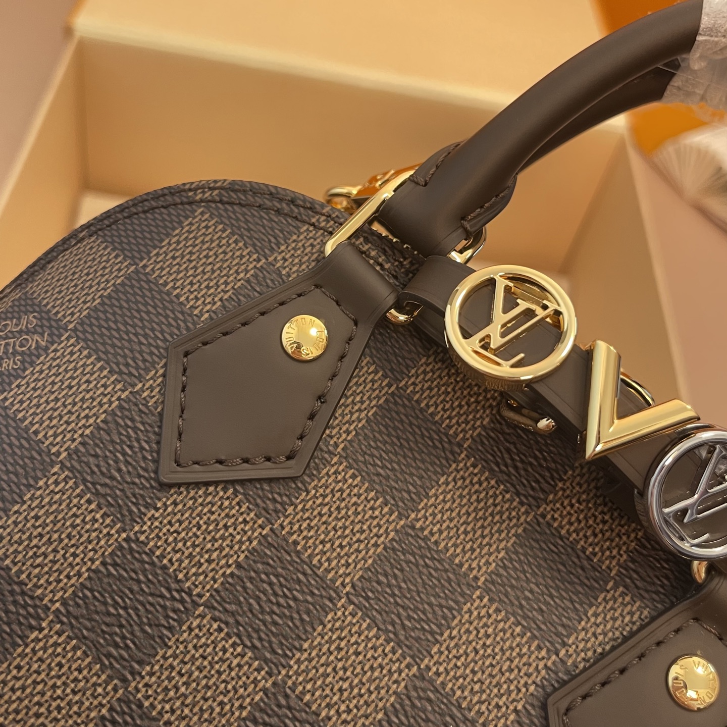 Louis Vuitton Alma Mini Handbag Damier Ebene Canvas with Heart Bag Charm 5 i1754914138853 8336 0 3