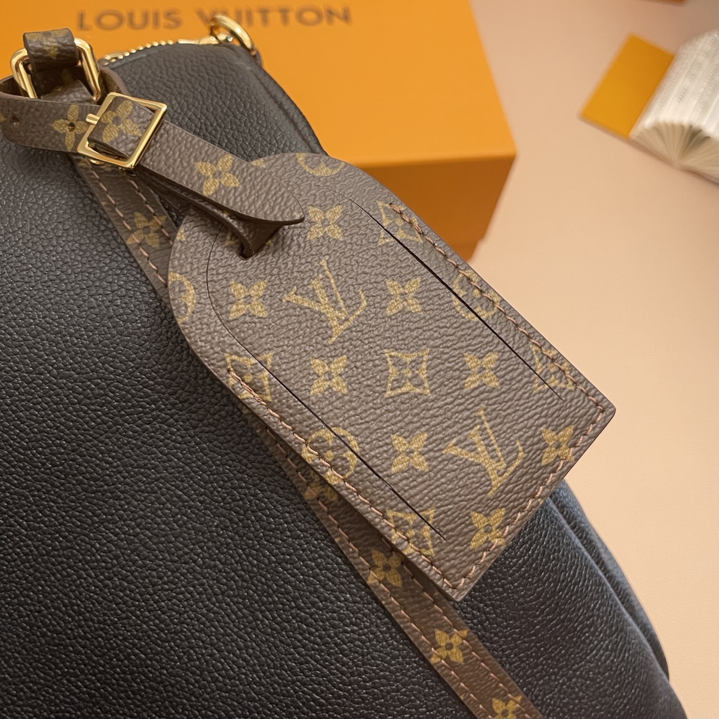 Louis Vuitton Express Bag: Stylish Leather Handbag with Classic Monogram Trim 3 i1755067499180 1774 0 2