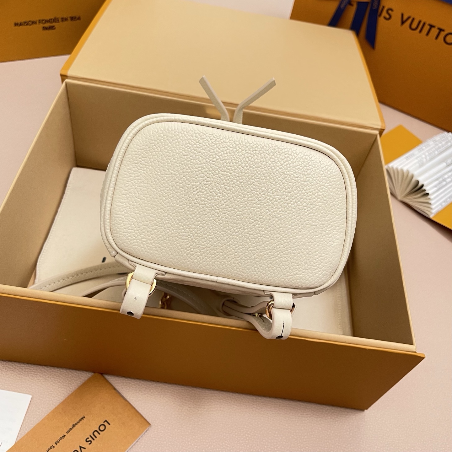 Louis Vuitton Nano Noé Backpack Monogram Embossed Leather Ivory 9 i1756380577100 3980 0 8
