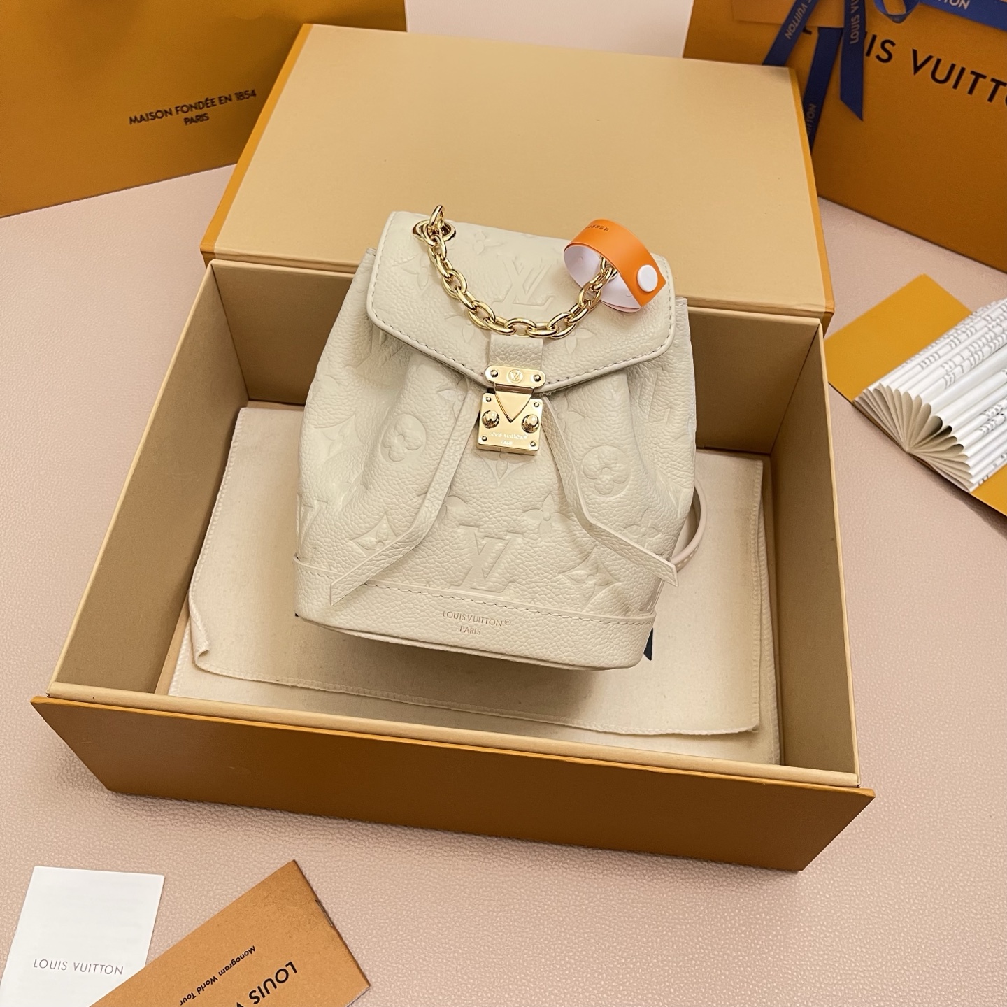 Louis Vuitton Nano Noé Backpack Monogram Embossed Leather Ivory 2 i1756380578534 5507 0 0