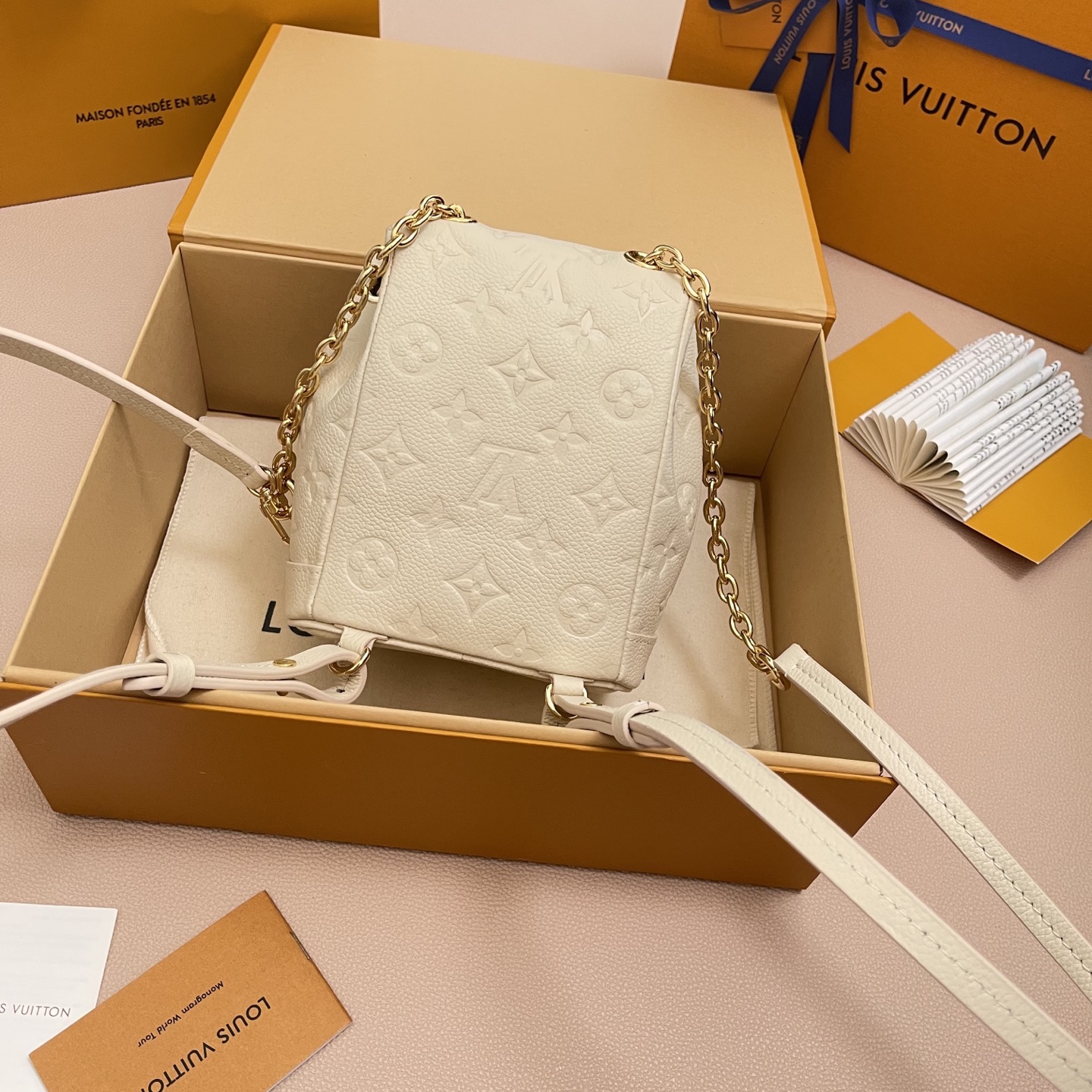 Louis Vuitton Nano Noé Backpack Monogram Embossed Leather Ivory 3 i1756380578901 4853 0 1