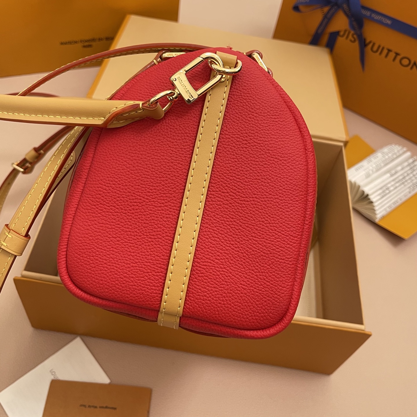 Louis Vuitton Expressential Red Leather Handbag with Monogram Detailing 4 i1756537308114 5290 0 2
