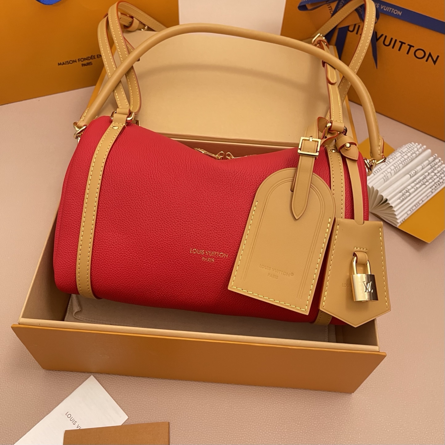 Louis Vuitton Expressential Red Leather Handbag with Monogram Detailing 2 i1756537308122 6743 0 0