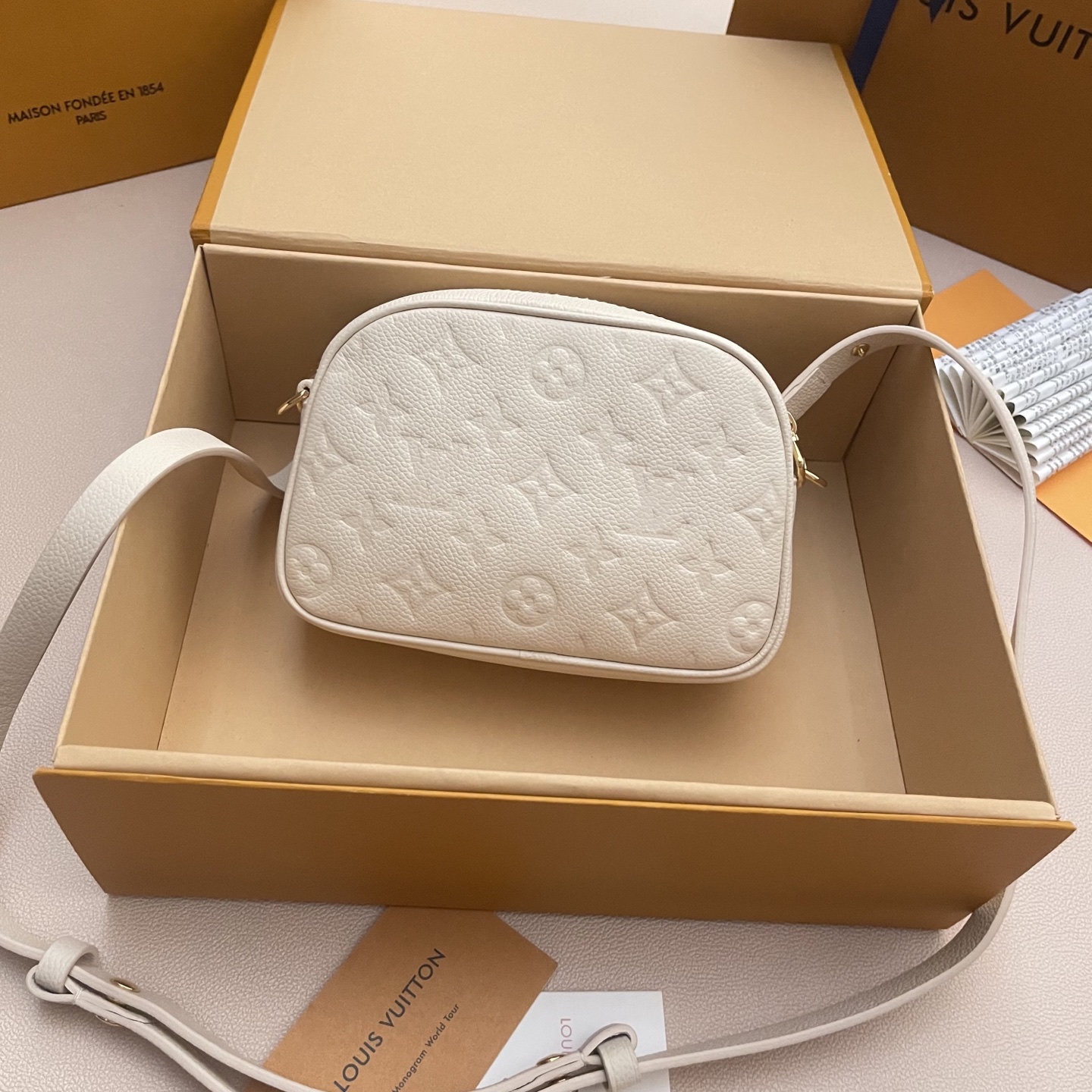 Louis Vuitton Monogram Empreinte Tiny Camera Bag - Elegant & Versatile 2 i1760879402951 10 0 1