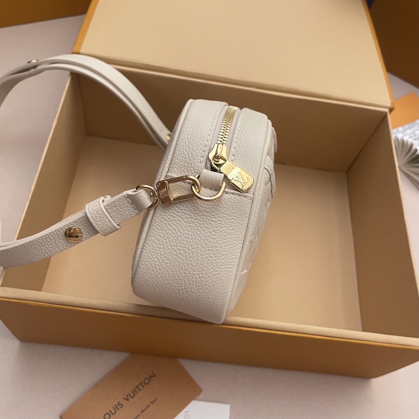 Louis Vuitton Monogram Empreinte Tiny Camera Bag - Elegant & Versatile 3 i1760879402994 510 0 2