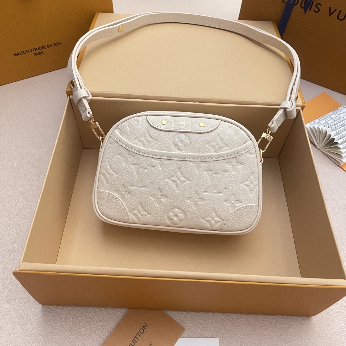 Louis Vuitton Monogram Empreinte Tiny Camera Bag - Elegant & Versatile 1 i1760879404829 5117 0 0