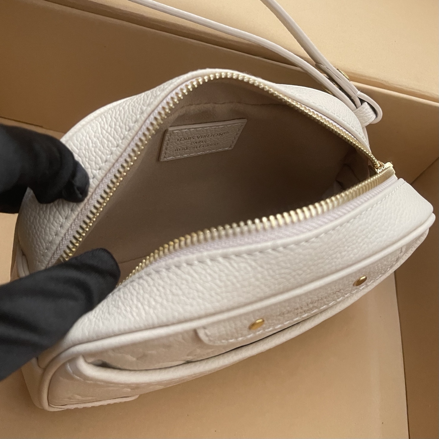 Louis Vuitton Monogram Empreinte Tiny Camera Bag - Elegant & Versatile 9 i1760879404987 8757 0 8
