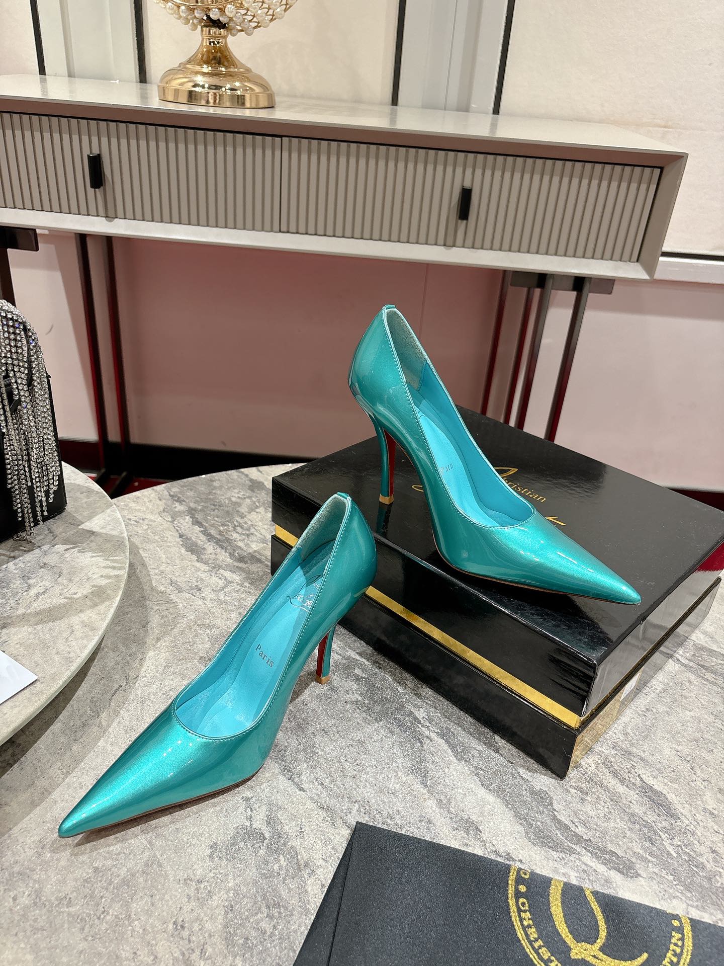 One-Shoe: Louboutin Red Heel with Everlasting Red Sole for Durability.