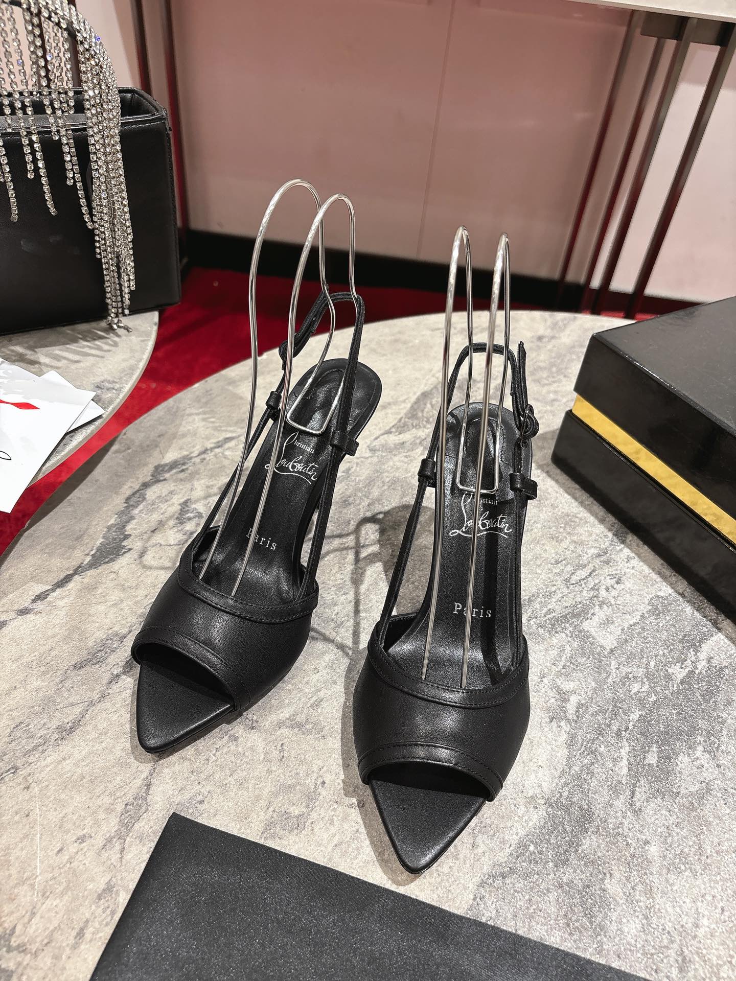 Christian Louboutin White Calfskin Sandals with Crystal Detail, 85mm heel, sizes 34-43. Signature red soles.