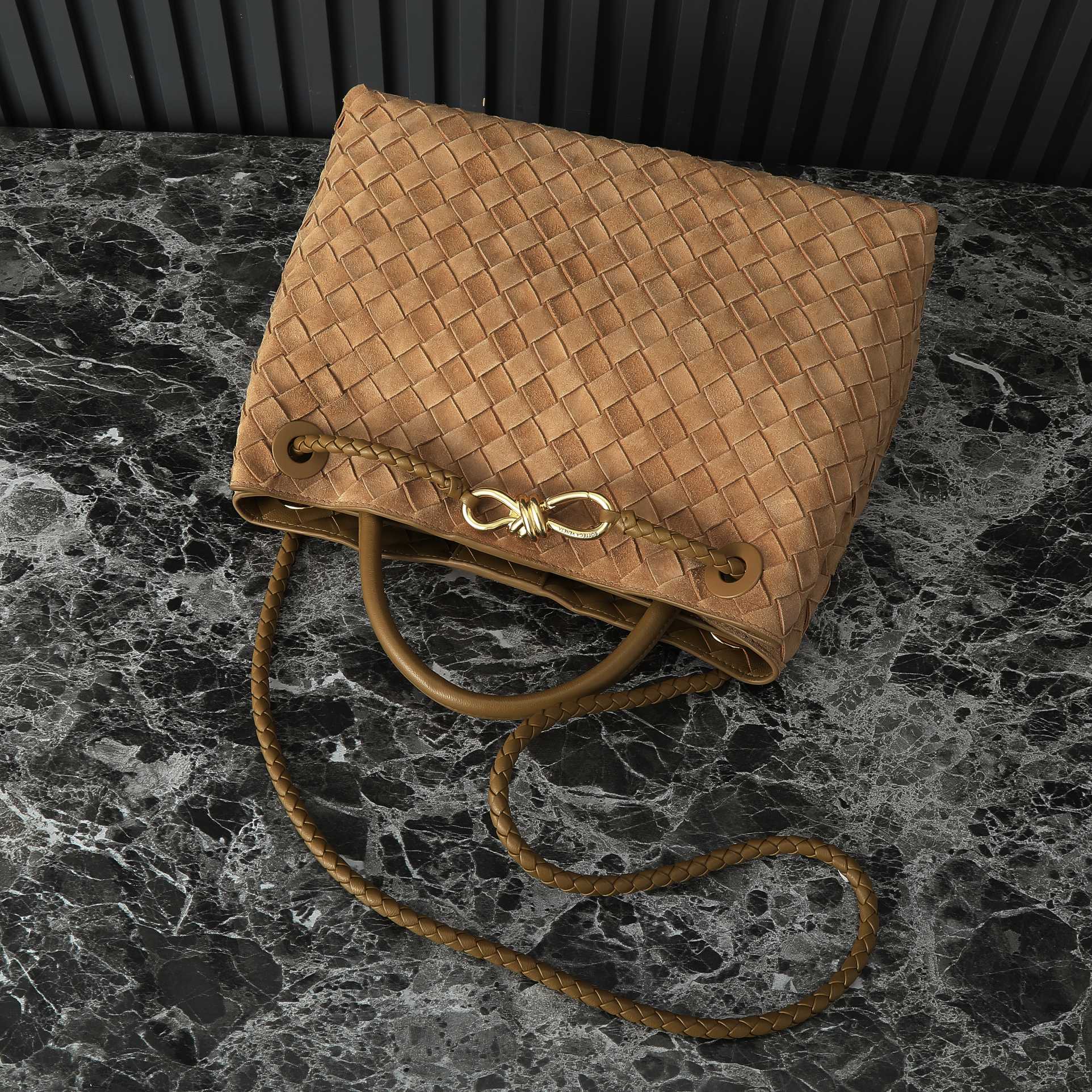 Bottega Veneta Andiamo Woven Handbag: Stylish, Spacious, and Versatile 6 a1712162964748 1402