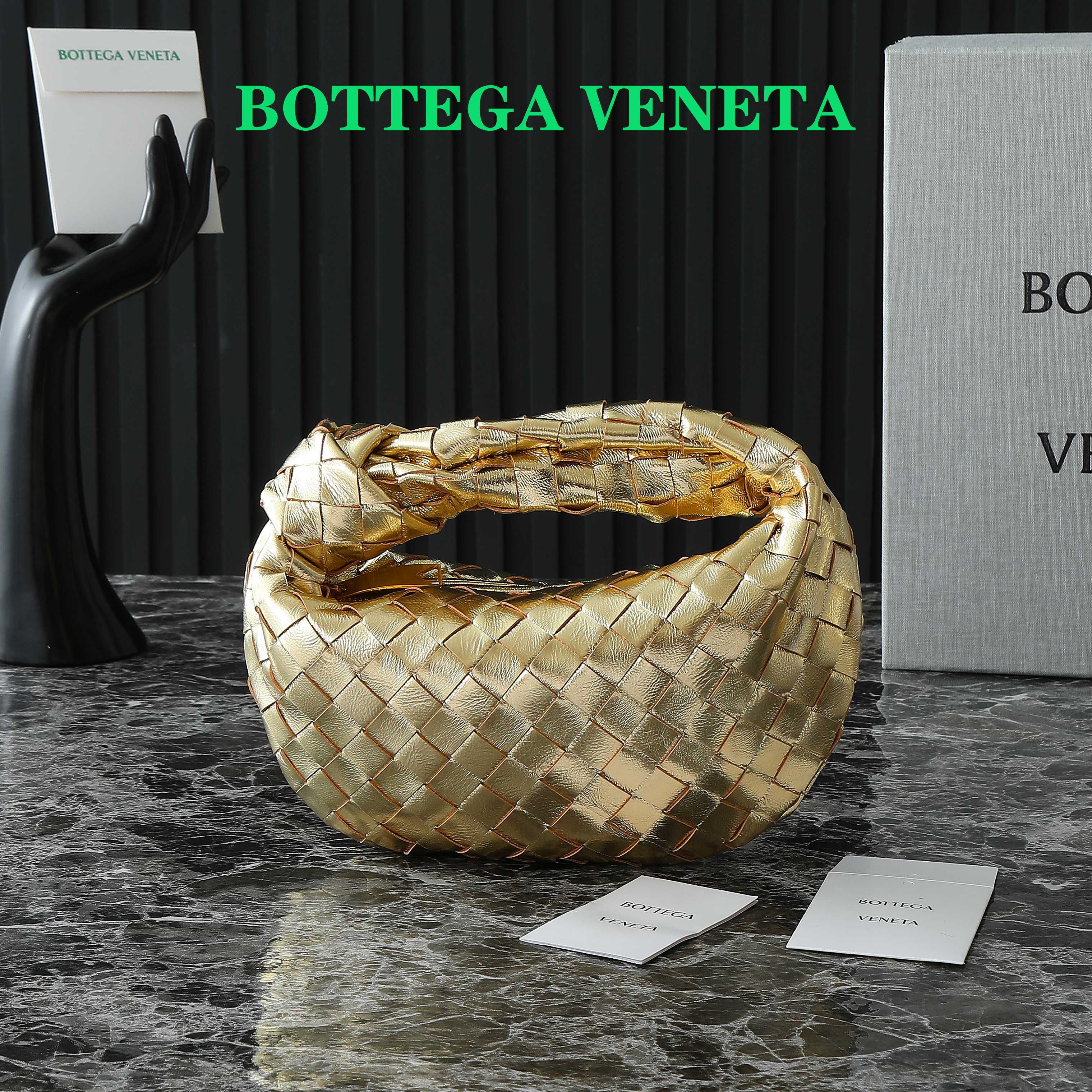 Bottega Veneta Mini Jodie Woven Metallic Gold Leather Top Handle Bag 1 a1744734639266 2246