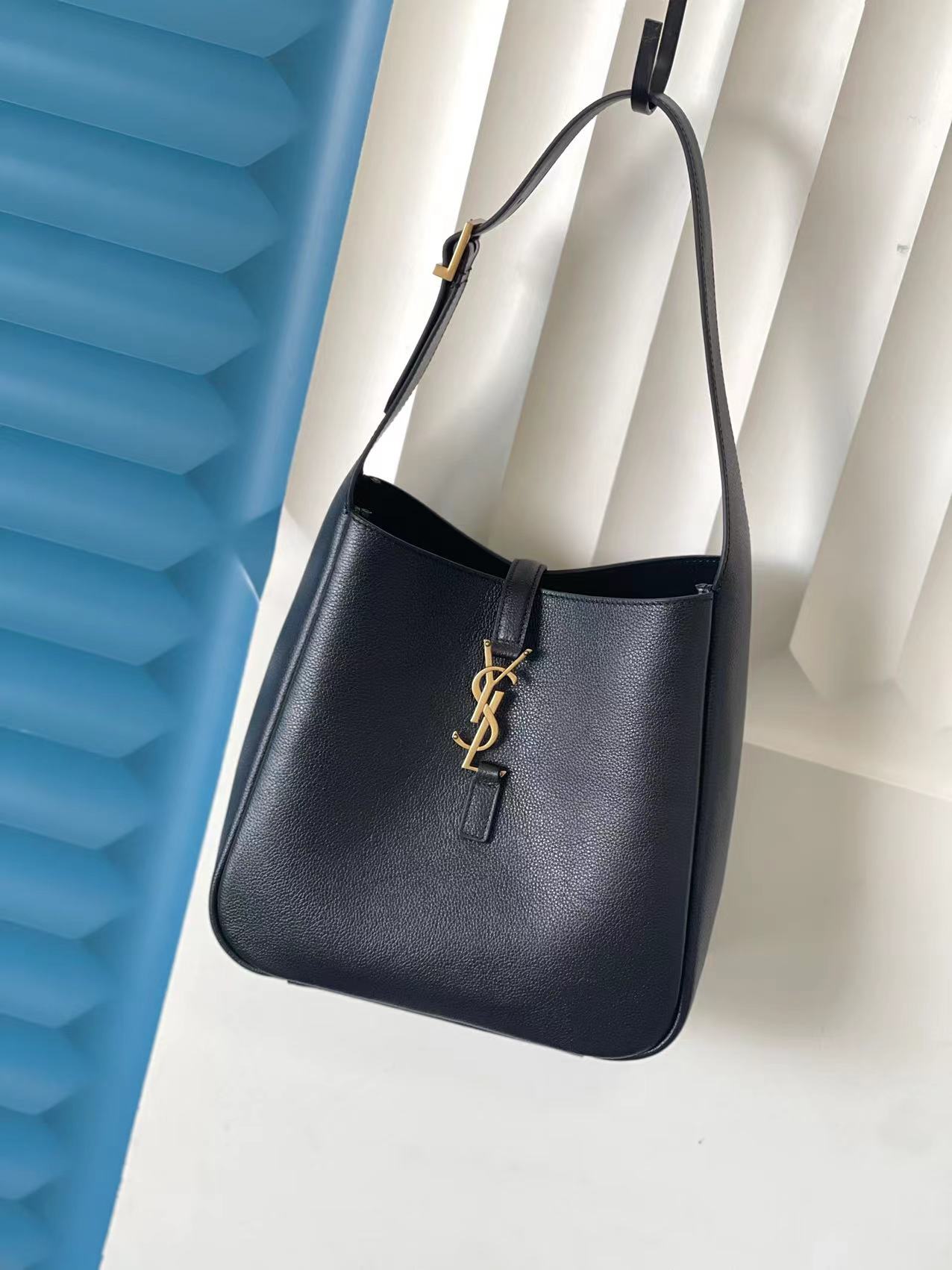 Leather hobo bag with insert buckle shoulder bag