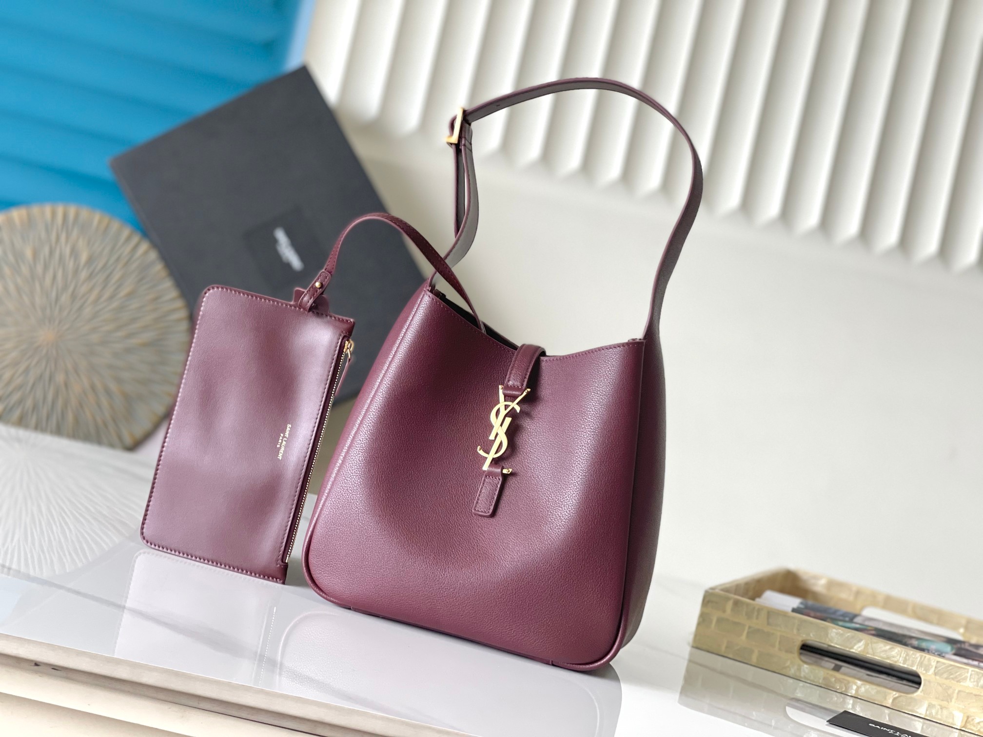 Leather hobo bag with insert clasp and small pouch