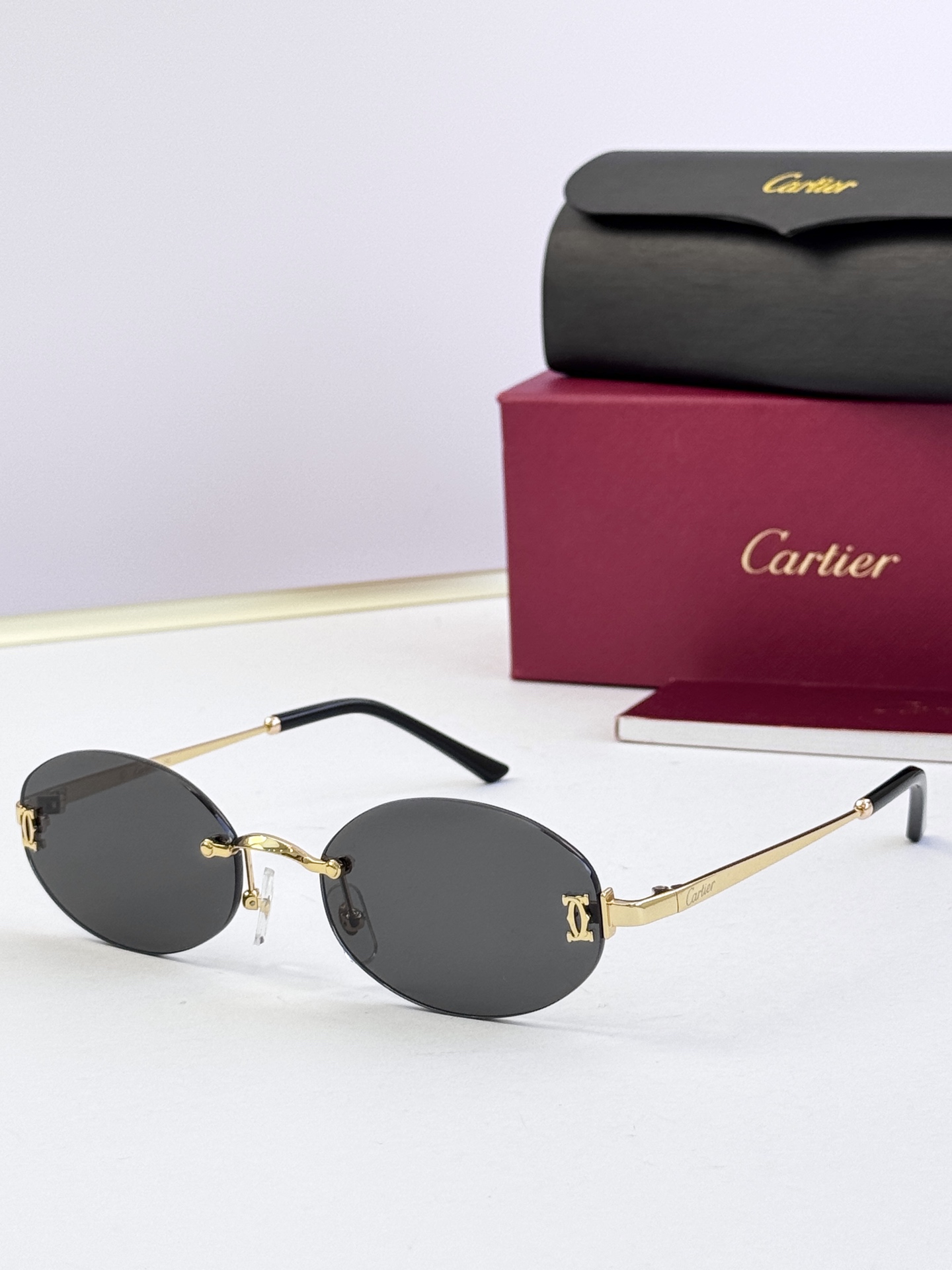 Cartier CT0592S Metal Oval Rimless Sunglasses