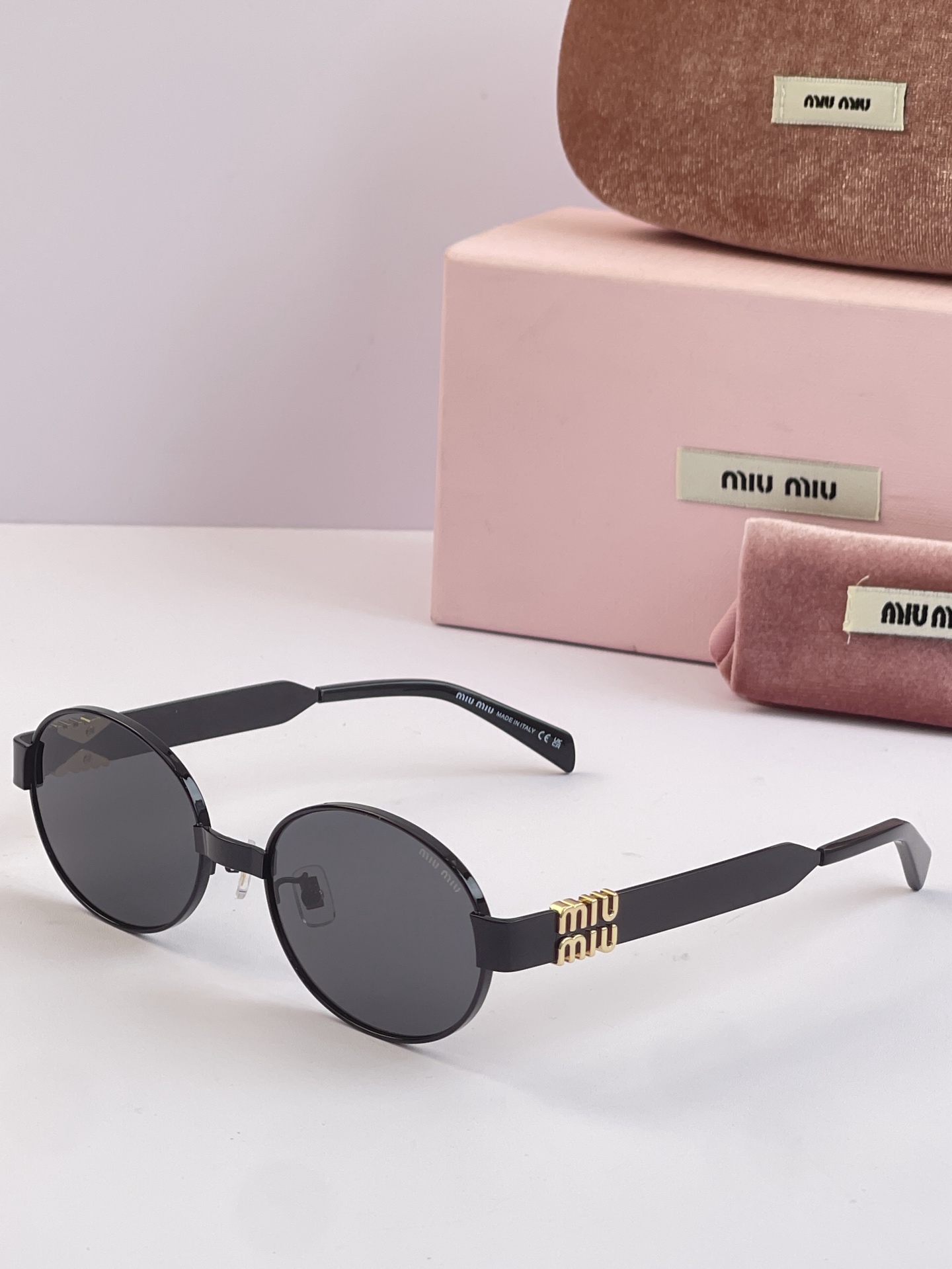 MIUMIU Sunglasses Metal Round Black