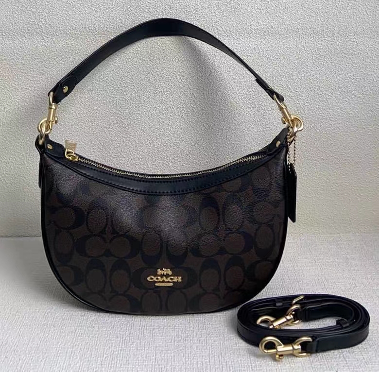 Coach new model, code: CO996, CO997, Mira Pea Bag comes with two shoulder straps for underarm and crossbody wear. The short shoulder strap features the latest vintage brass material for a heavy, durable feel and a retro touch. Dimensions: Bottom width 18, opening 26, height 36 (vertical handle), thickness 5. image 1